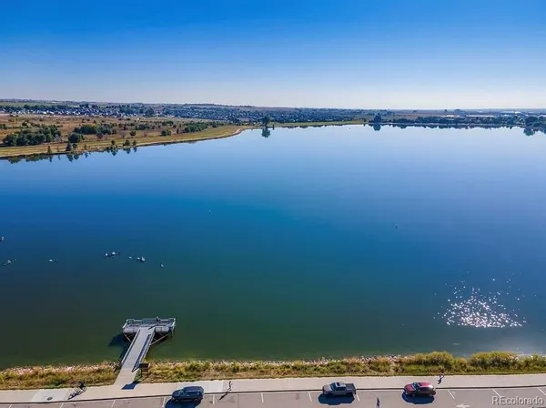 a view of an ocean and city