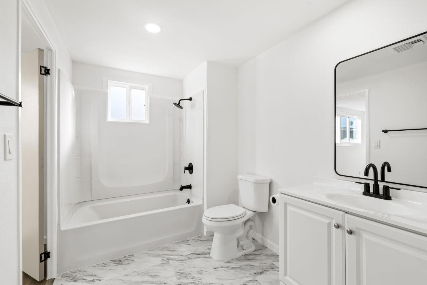 20 Russell Road, Unit 86 Salinas, CA 93906 - Photo 18 of 43 a bathroom with a sink a toilet and shower