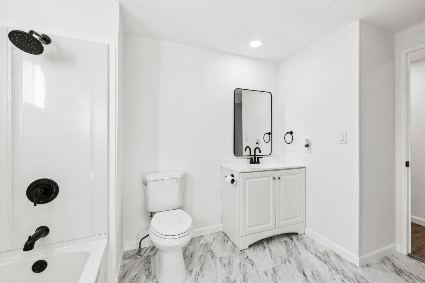 20 Russell Road, Unit 86 Salinas, CA 93906 - Photo 33 of 43 a bathroom with a toilet sink and shower