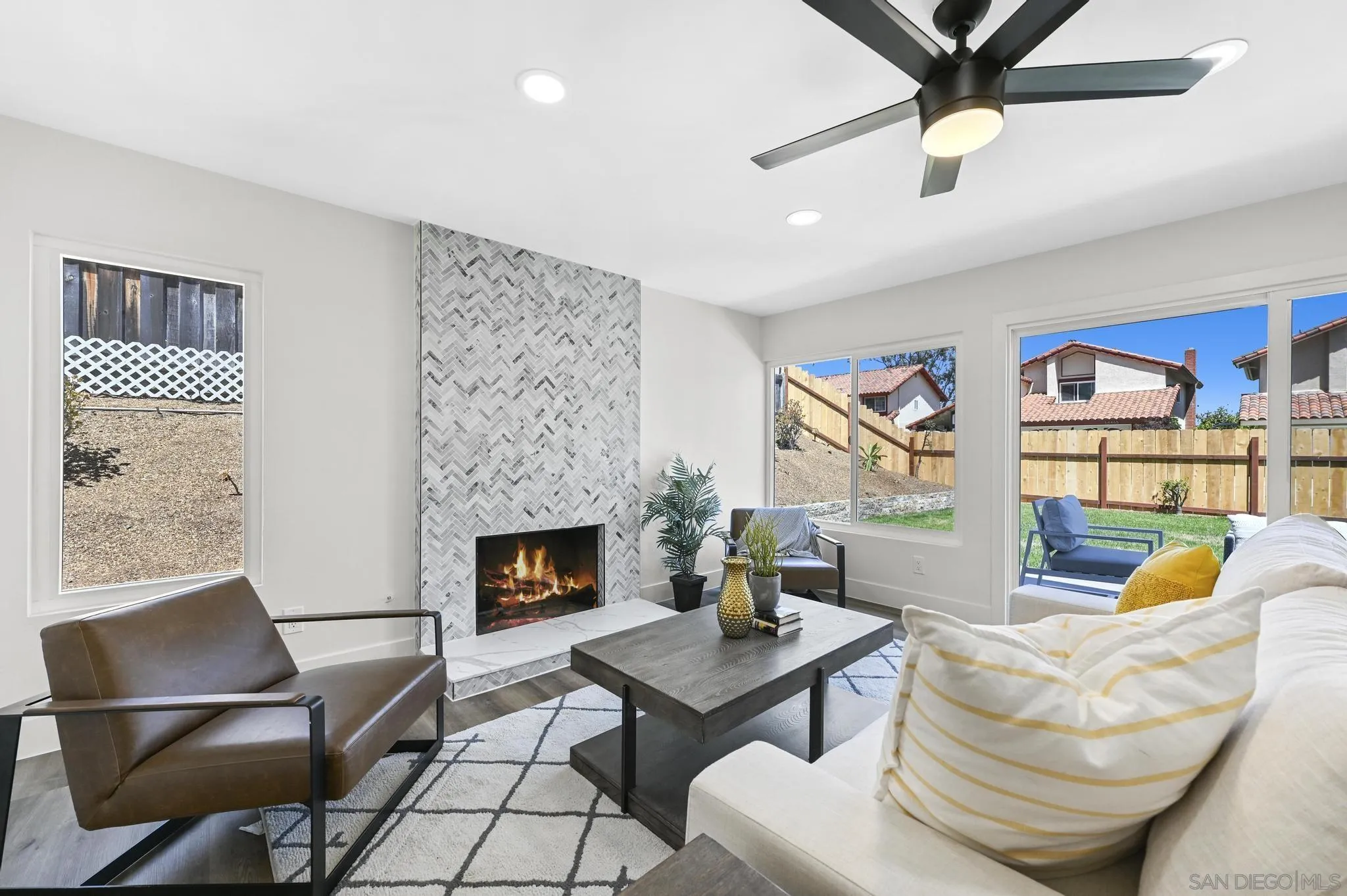 14463 Janal Way San Diego, CA 92129 - Photo 1 of 44 a living room with furniture and a fireplace