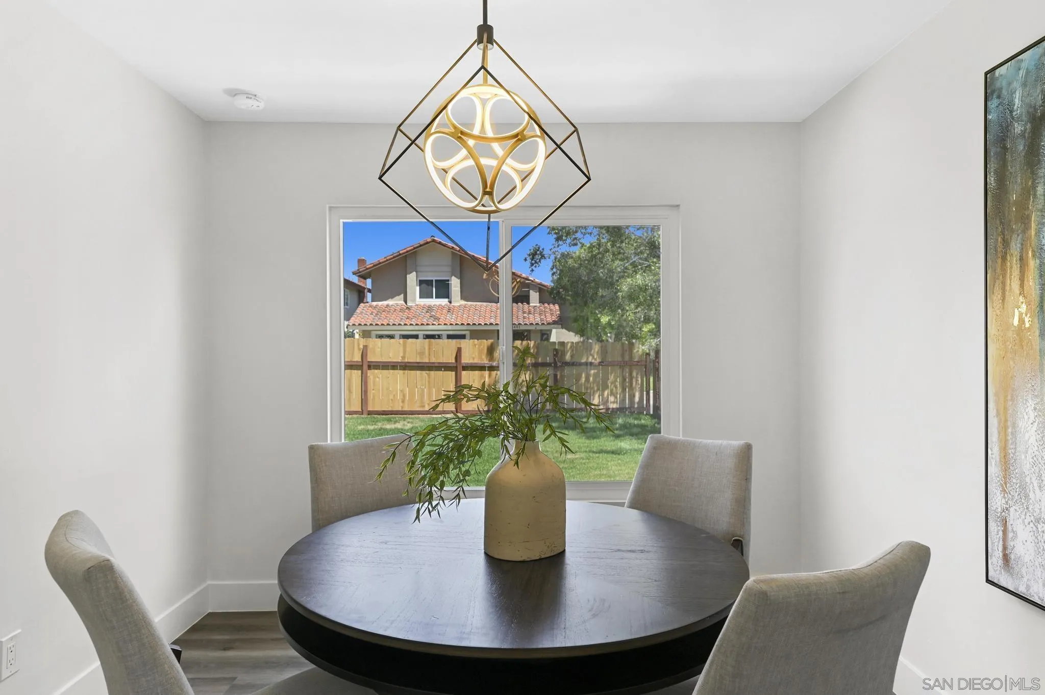 14463 Janal Way San Diego, CA 92129 - Photo 12 of 44 a dining room with furniture and a window
