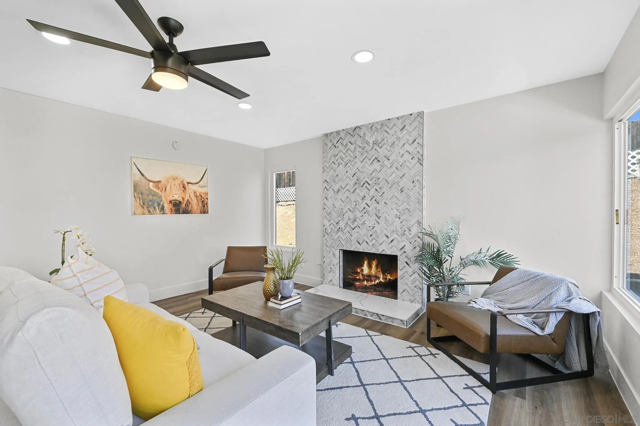 14463 Janal Way San Diego, CA 92129 - Photo 20 of 44 a living room with furniture and a fireplace