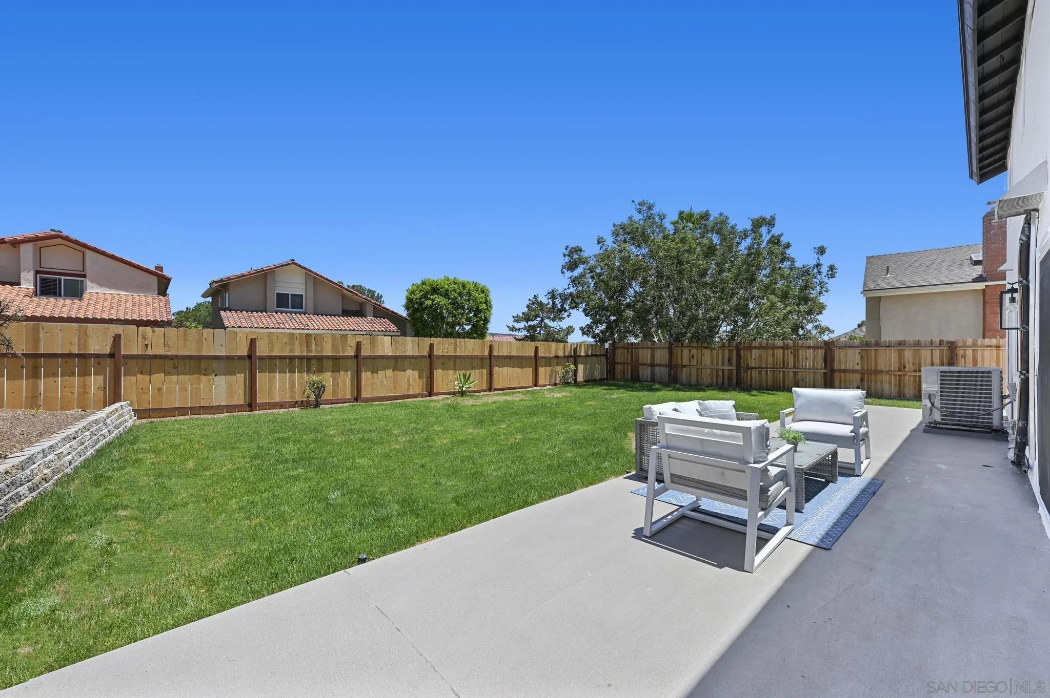 14463 Janal Way San Diego, CA 92129 - Photo 35 of 44 a view of backyard with seating area and green space