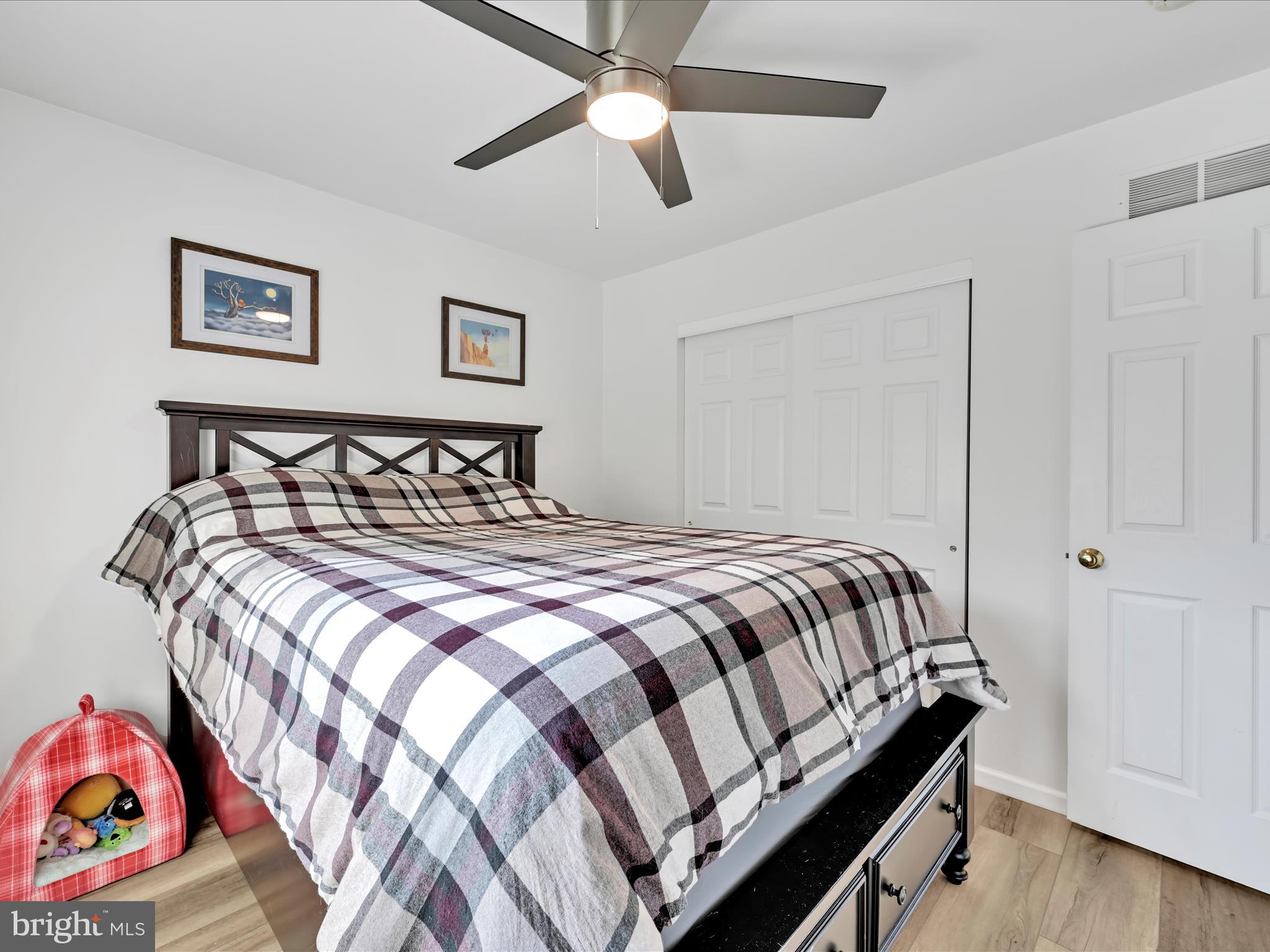 2518 Jacob Drive Reading, PA 19608 - Photo 30 of 41 a bedroom with a bed and wooden floor