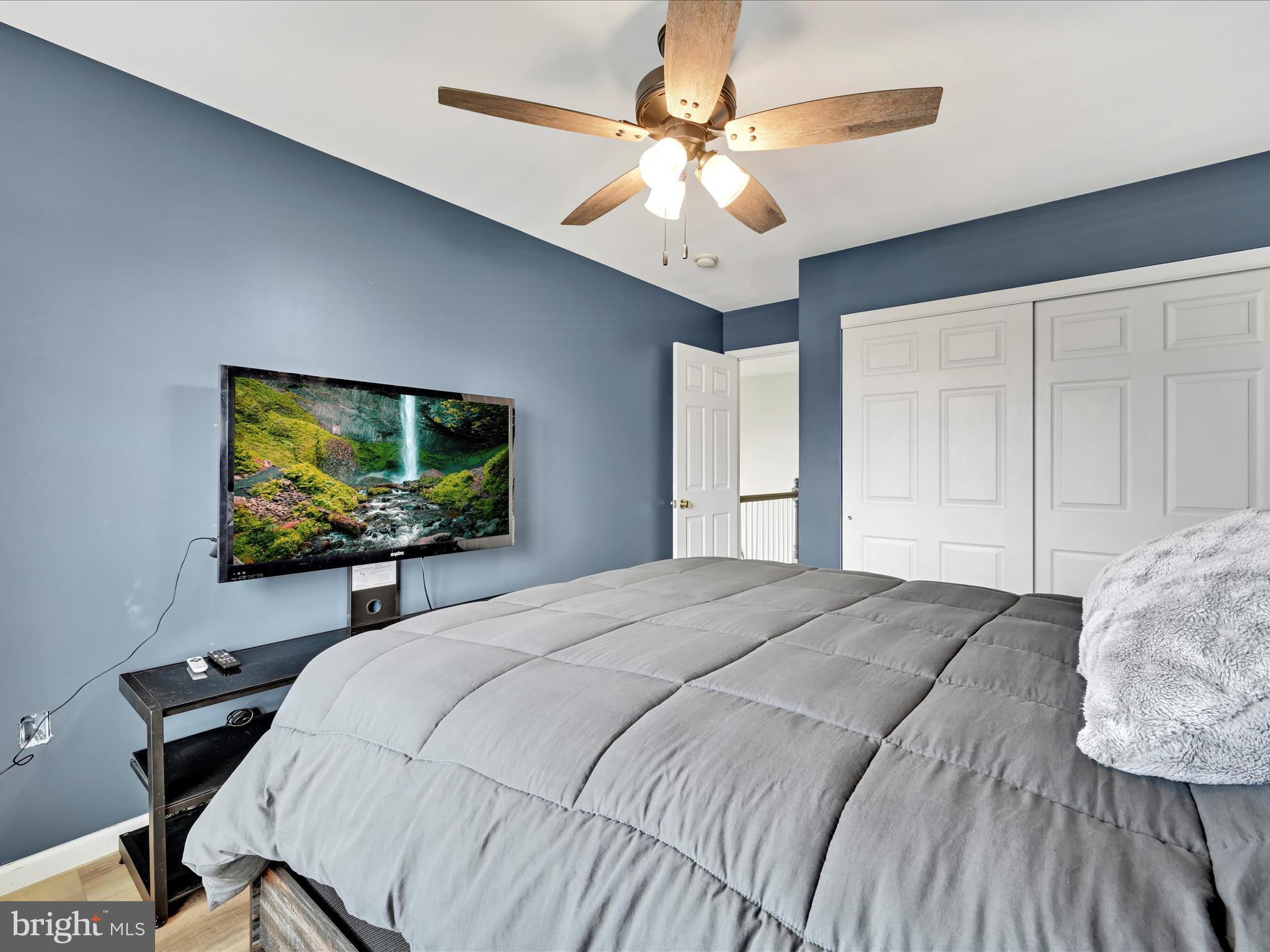 2518 Jacob Drive Reading, PA 19608 - Photo 33 of 41 a bedroom with a bed and a flat screen tv