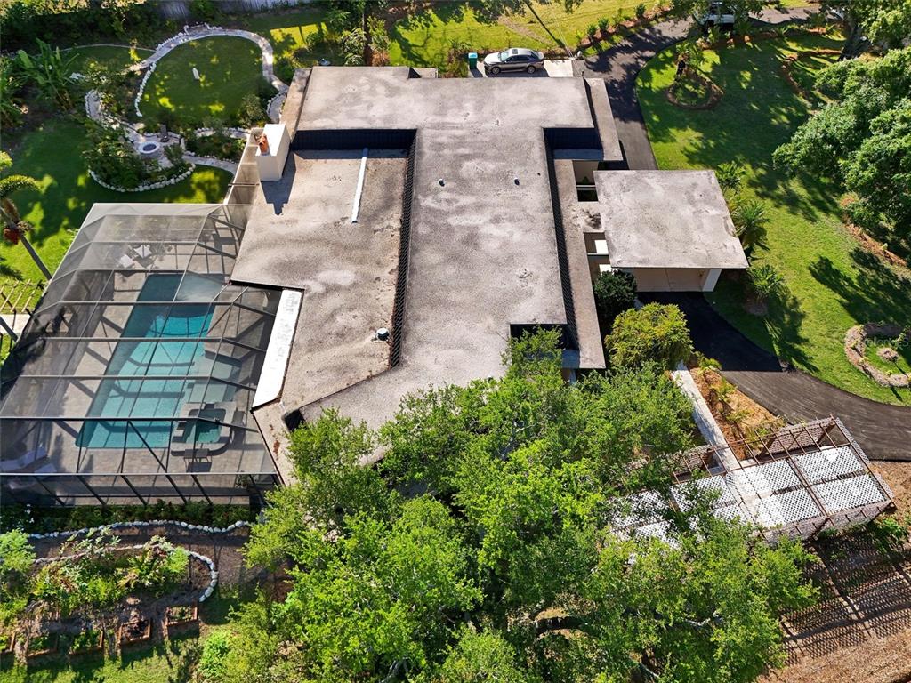 1875 Belleair Road Clearwater, FL 33764 - Photo 81 of 100 an aerial view of a house with a yard