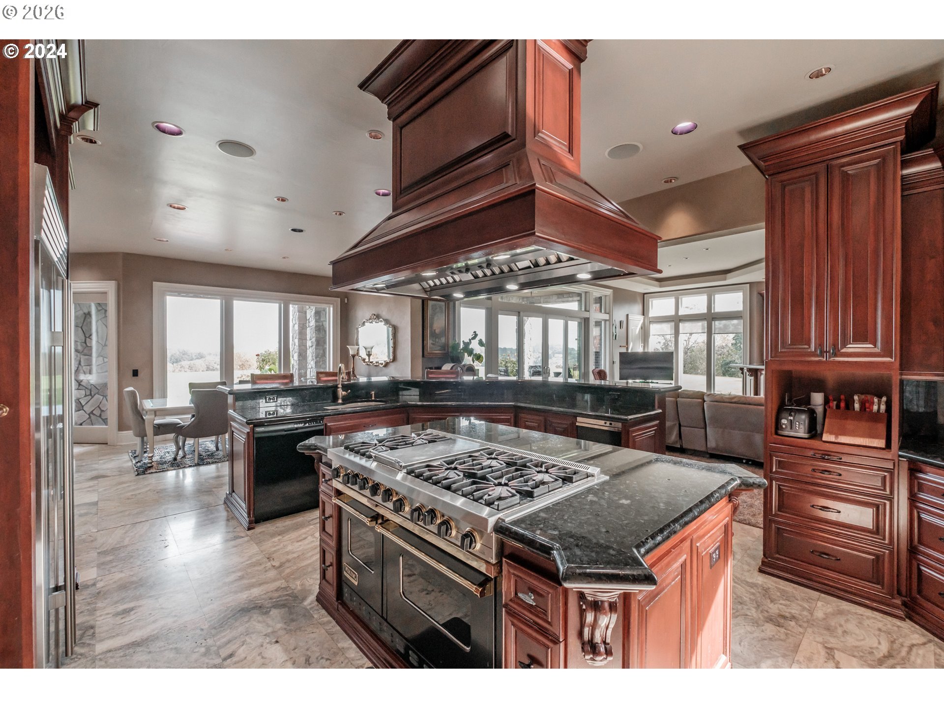 2554 Cole Road South Salem, OR 97306 - Photo 17 of 35 a kitchen with a stove and a kitchen island
