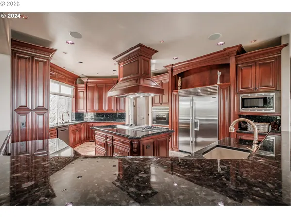 a living room with furniture a flat screen tv and large window