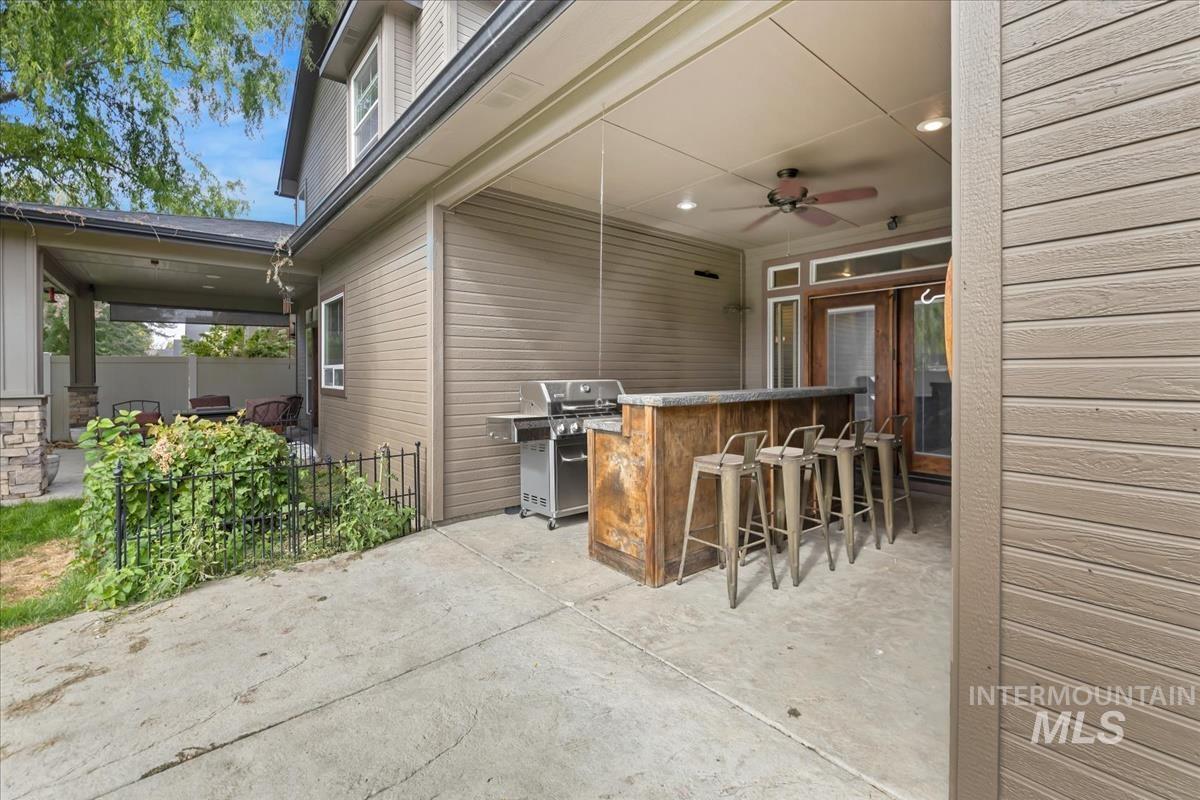 2543 West Divide Creek Street Meridian, ID 83646 - Photo 41 of 49 View of patio / terrace with a ceiling fan and area for grilling
