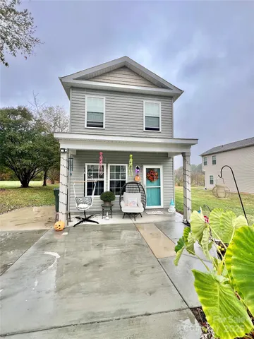 front view of a house with a patio