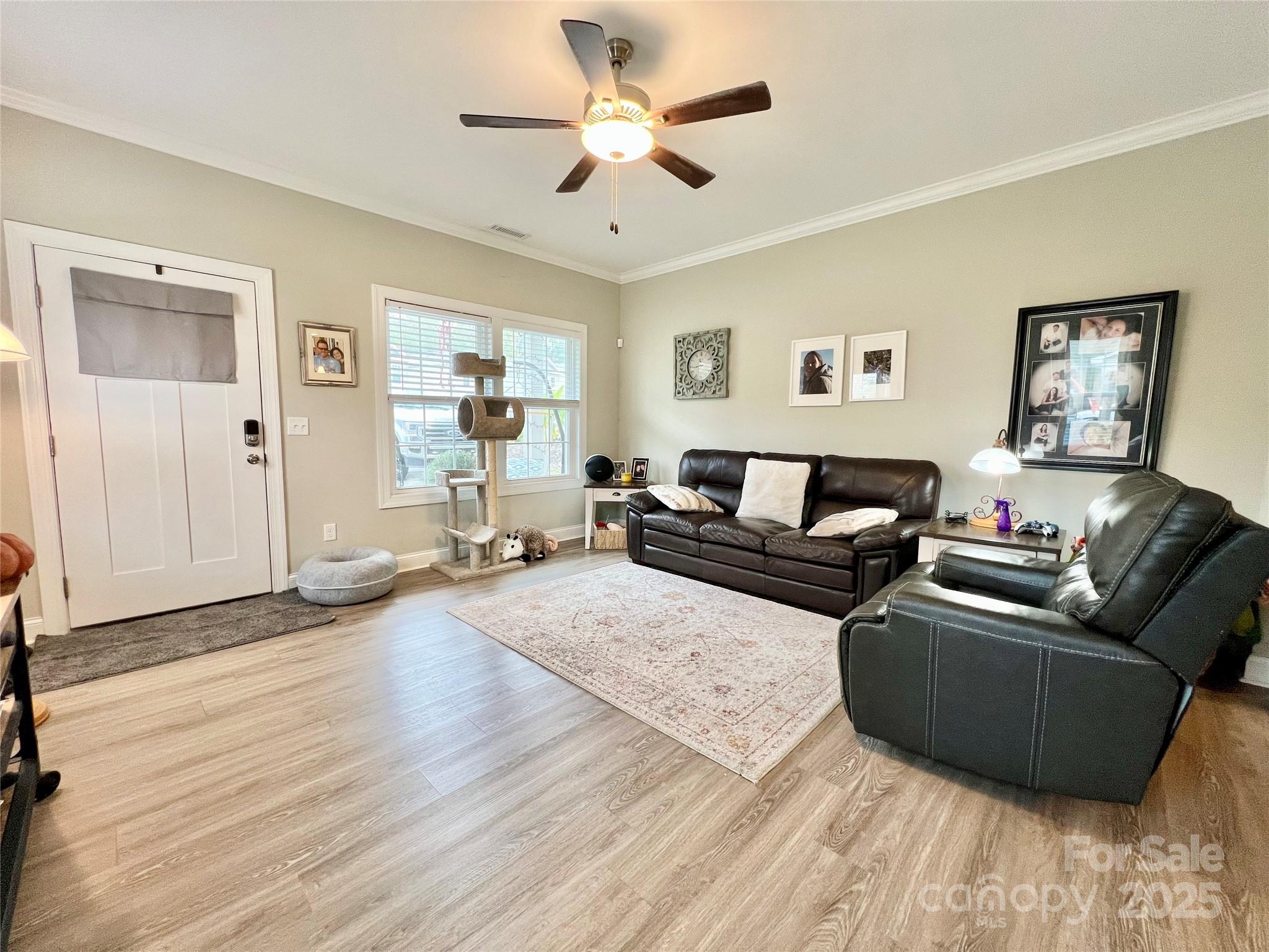 1781 17th Avenue Northeast Hickory, NC 28601 - Photo 13 of 26 a living room with furniture and a wooden floor