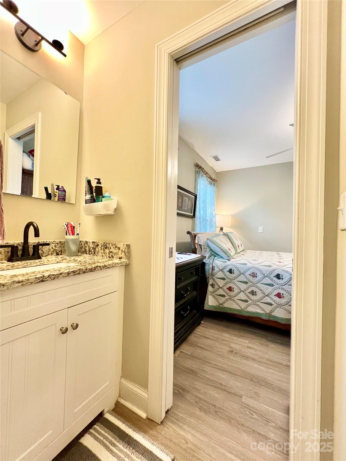 1781 17th Avenue Northeast Hickory, NC 28601 - Photo 21 of 26 a en suite bathroom with a tub and mirror