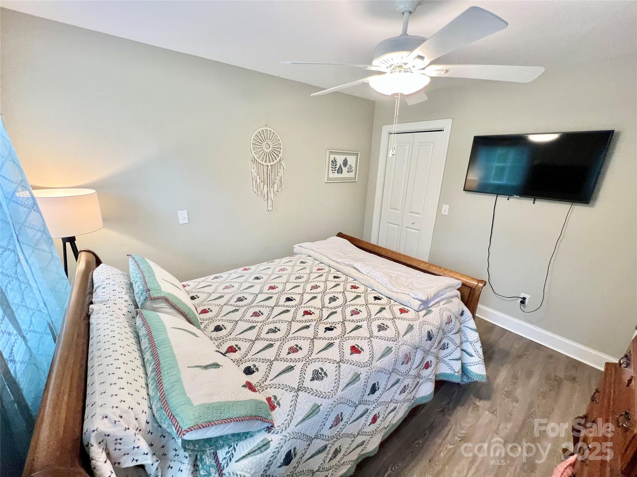 1781 17th Avenue Northeast Hickory, NC 28601 - Photo 22 of 26 a bedroom with a bed and a flat screen tv