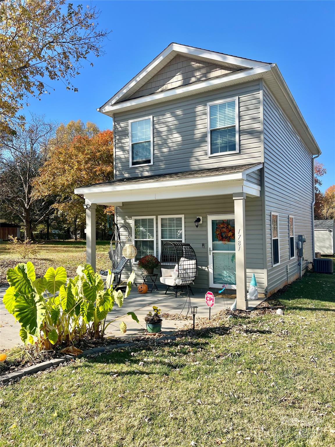 1781 17th Avenue Northeast Hickory, NC 28601 - Photo 3 of 26 a front view of a house with a yard table and chairs