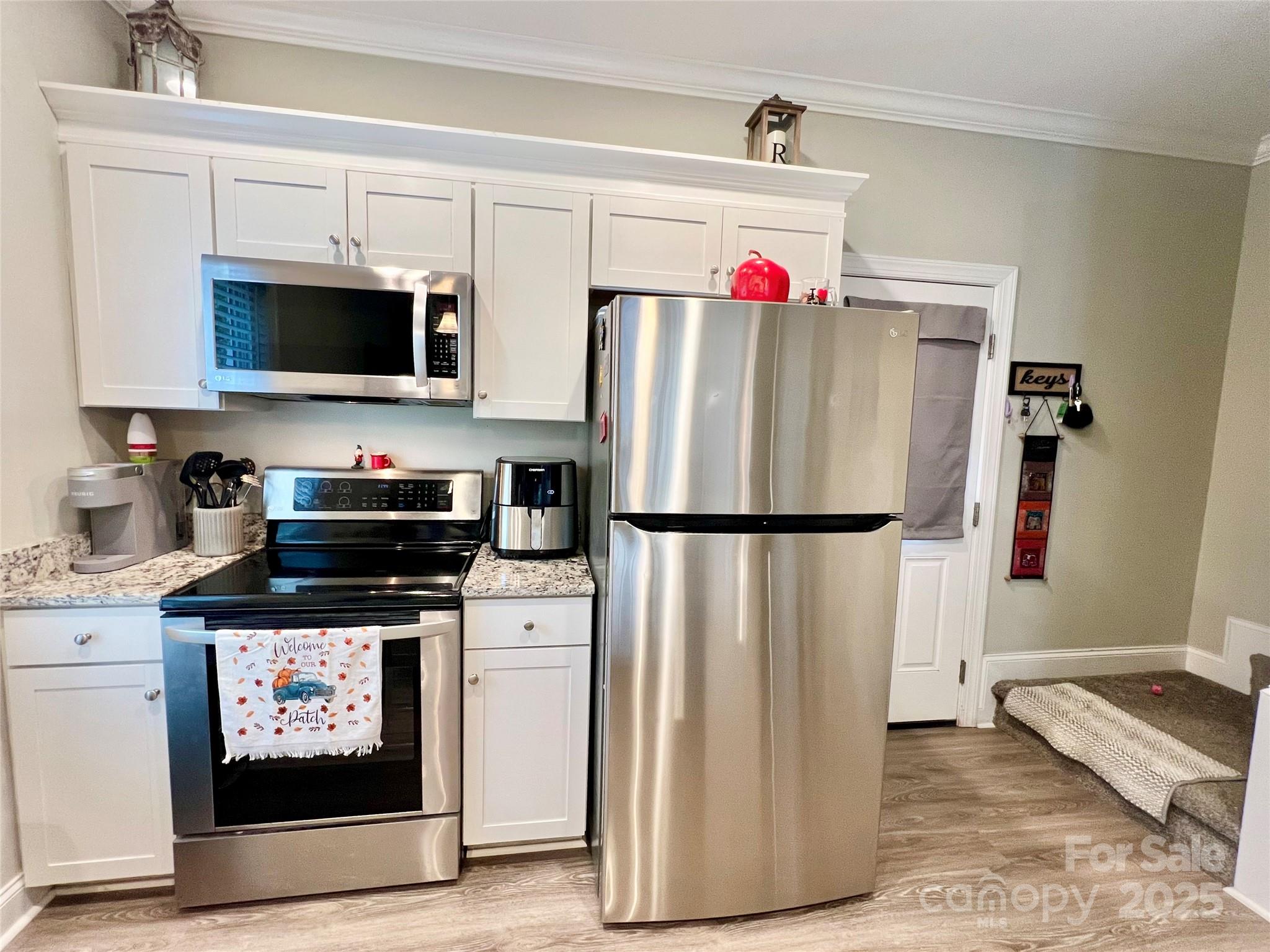 1781 17th Avenue Northeast Hickory, NC 28601 - Photo 7 of 26 a refrigerator freezer sitting inside of a kitchen