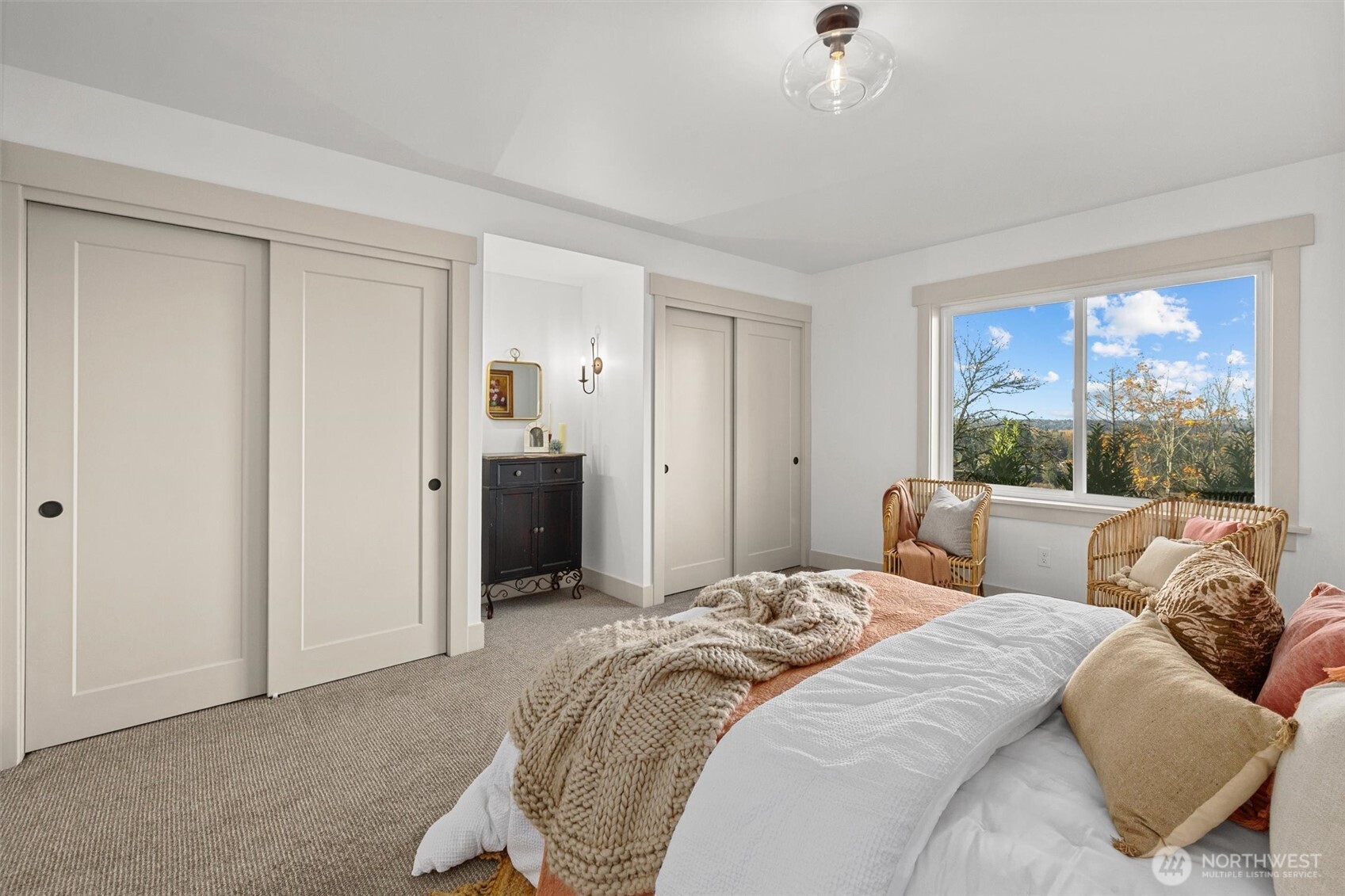 9813 Moran Road Arlington, WA 98223 - Photo 30 of 40 a bedroom with a bed and a window