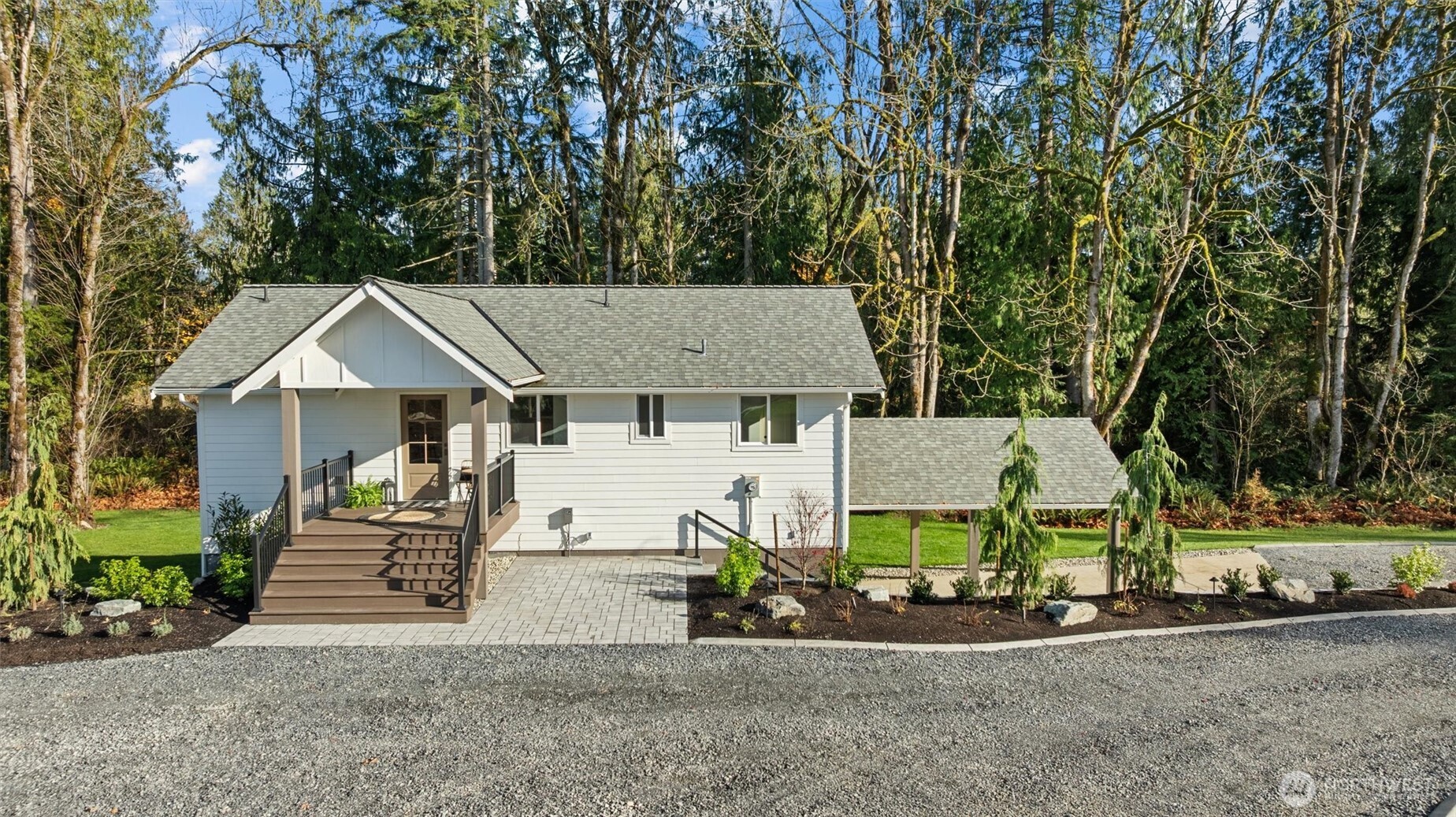9813 Moran Road Arlington, WA 98223 - Photo 33 of 40 an aerial view of a house with a garden and plants