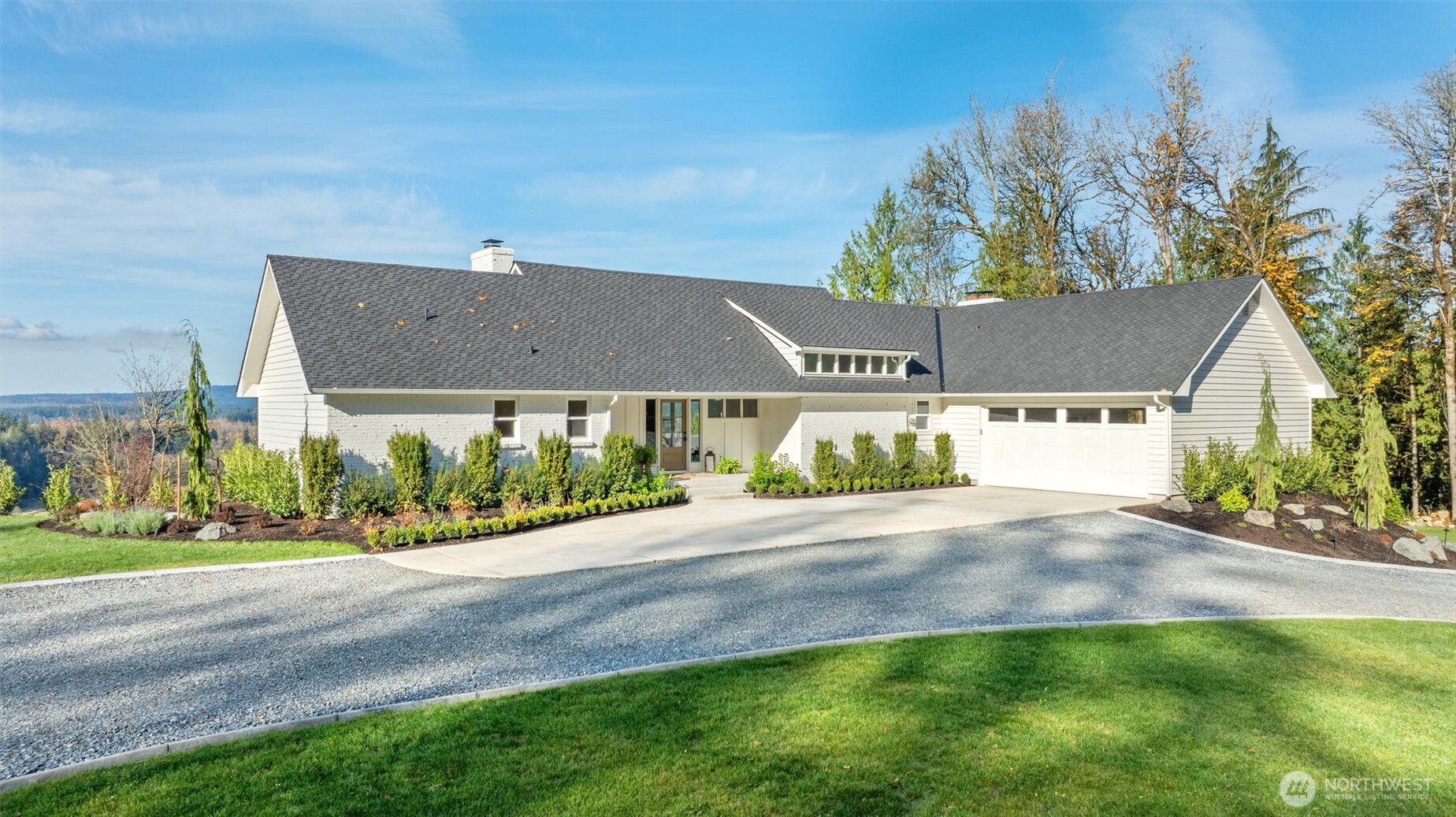 9813 Moran Road Arlington, WA 98223 - Photo 8 of 40 front view of house with a yard and a car park