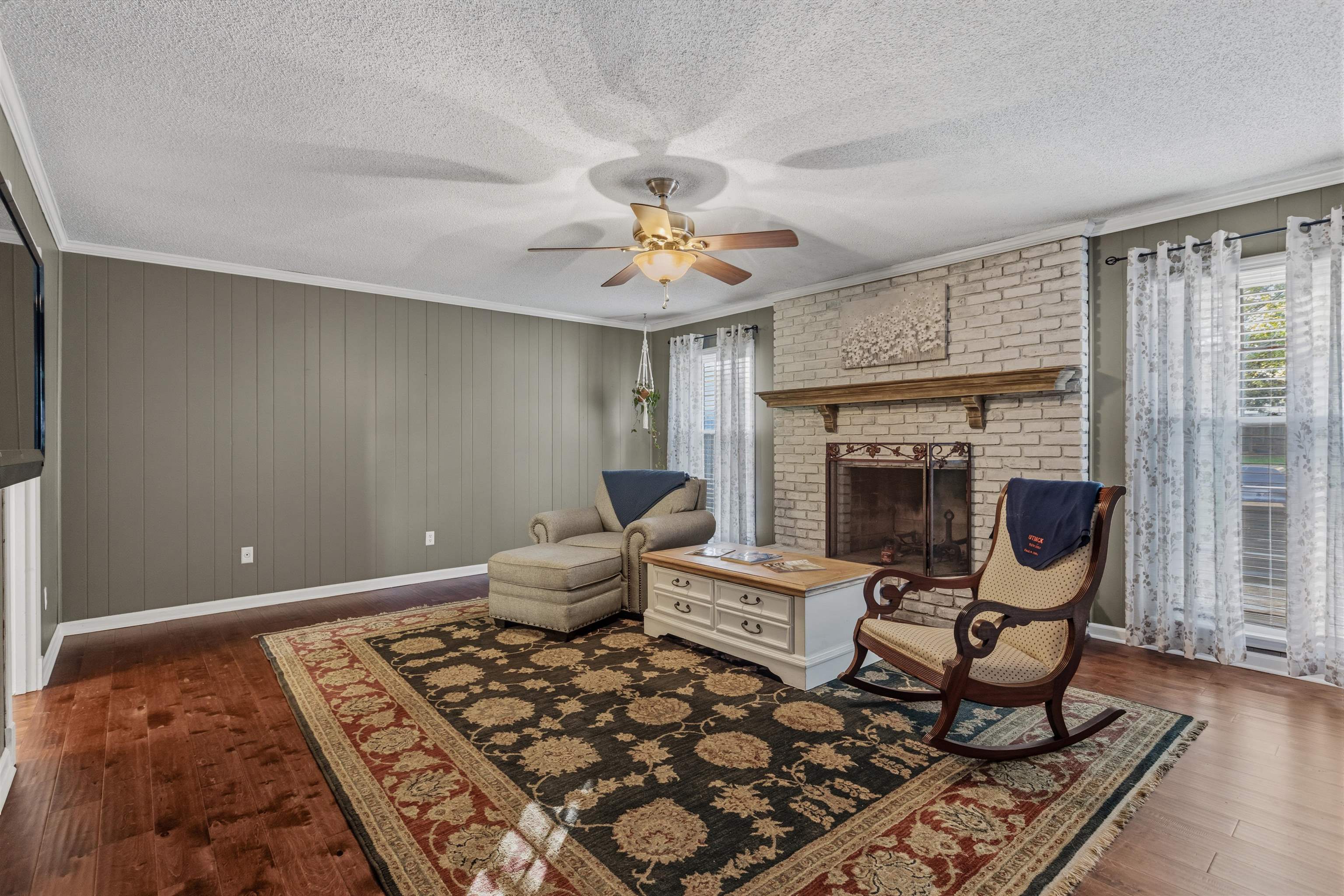 115 West Powell Road Collierville, TN 38017 - Photo 3 of 17 a living room with furniture and a fireplace