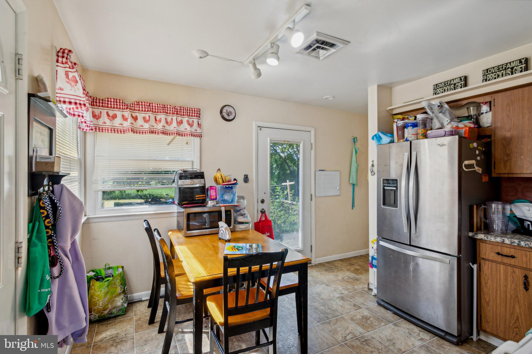 361 Salem Hancocks Bridge Road Salem, NJ 08079 - Photo 6 of 11 a view of a dining room with furniture window and outside view