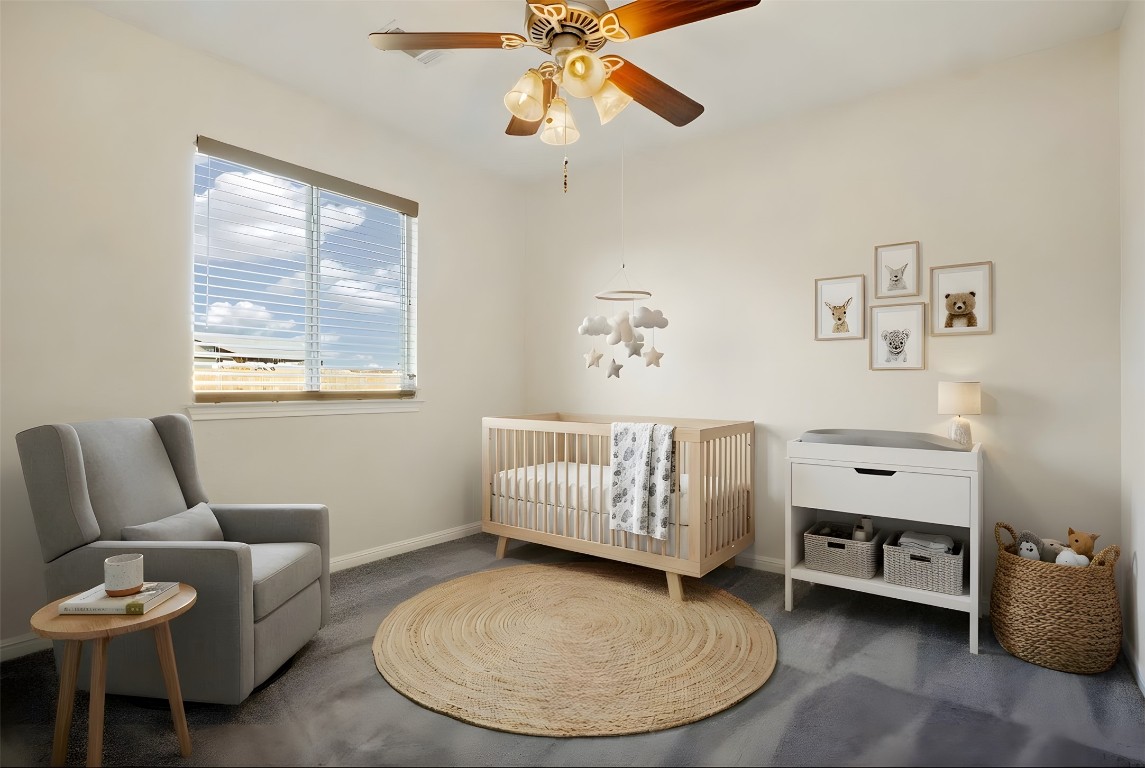 167 Hay Meadow Road Cedar Creek, TX 78612 - Photo 25 of 39 Virtually staged - Bedroom #3 featuring a ceiling fan, dark carpet and a ceiling fan