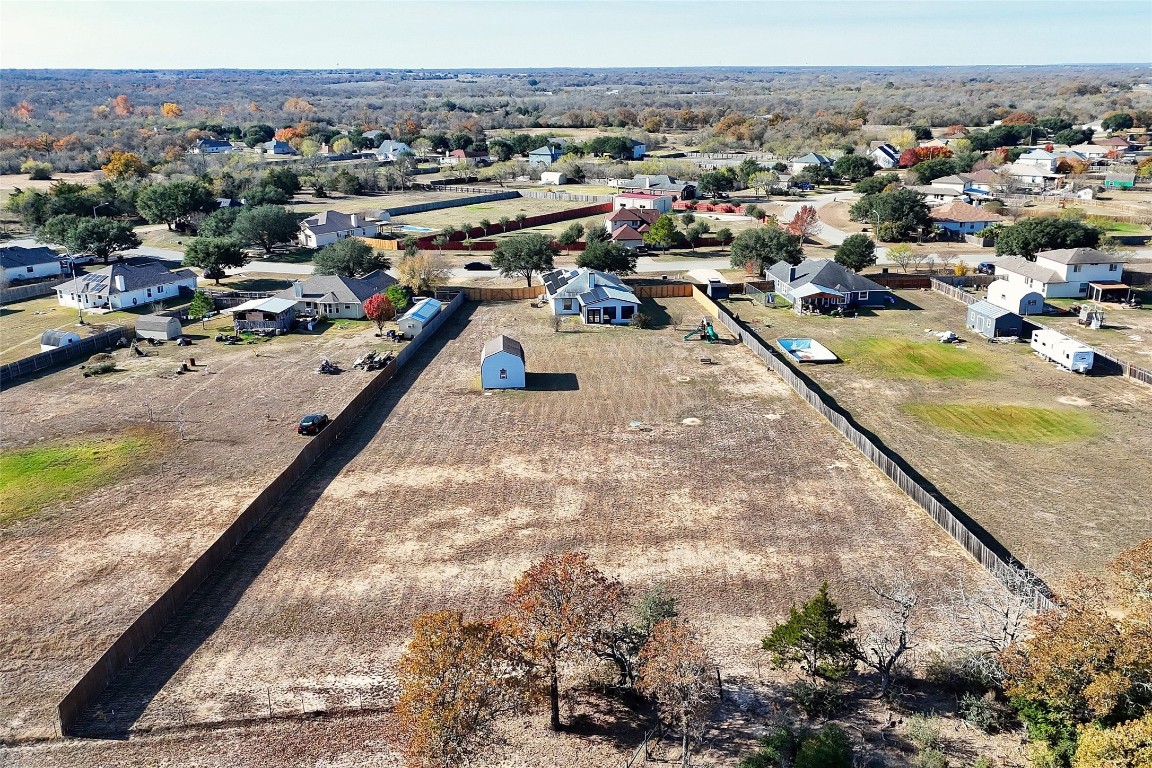 167 Hay Meadow Road Cedar Creek, TX 78612 - Photo 31 of 39 Aerial perspective of rear view of 1.3 acres