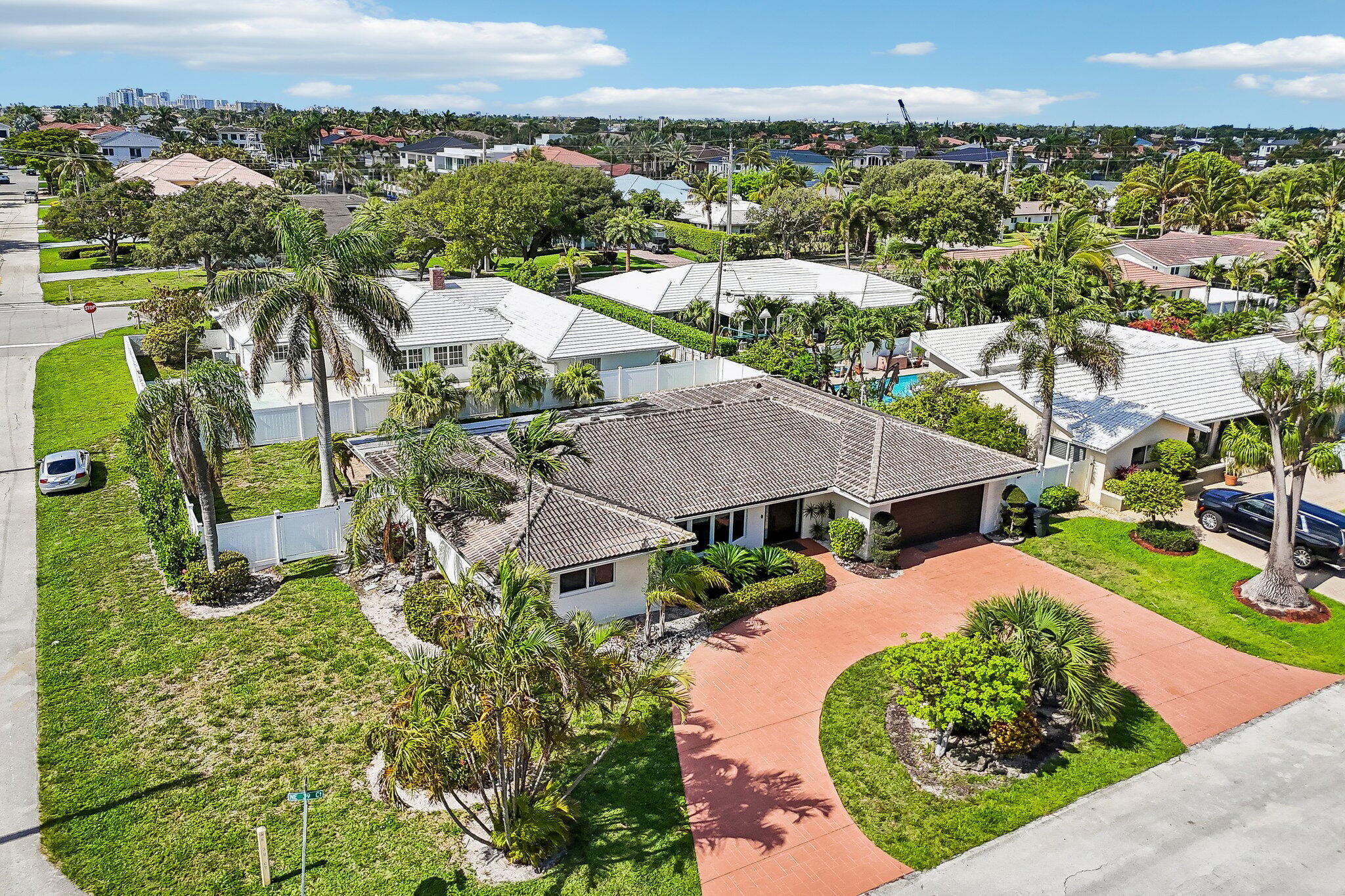 2940 Northeast 39th Court Lighthouse Point, FL 33064 - Photo 35 of 42 an aerial view of a house with a garden and lake view