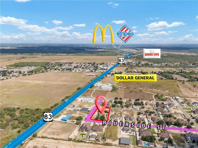 a view of a city with an ocean view