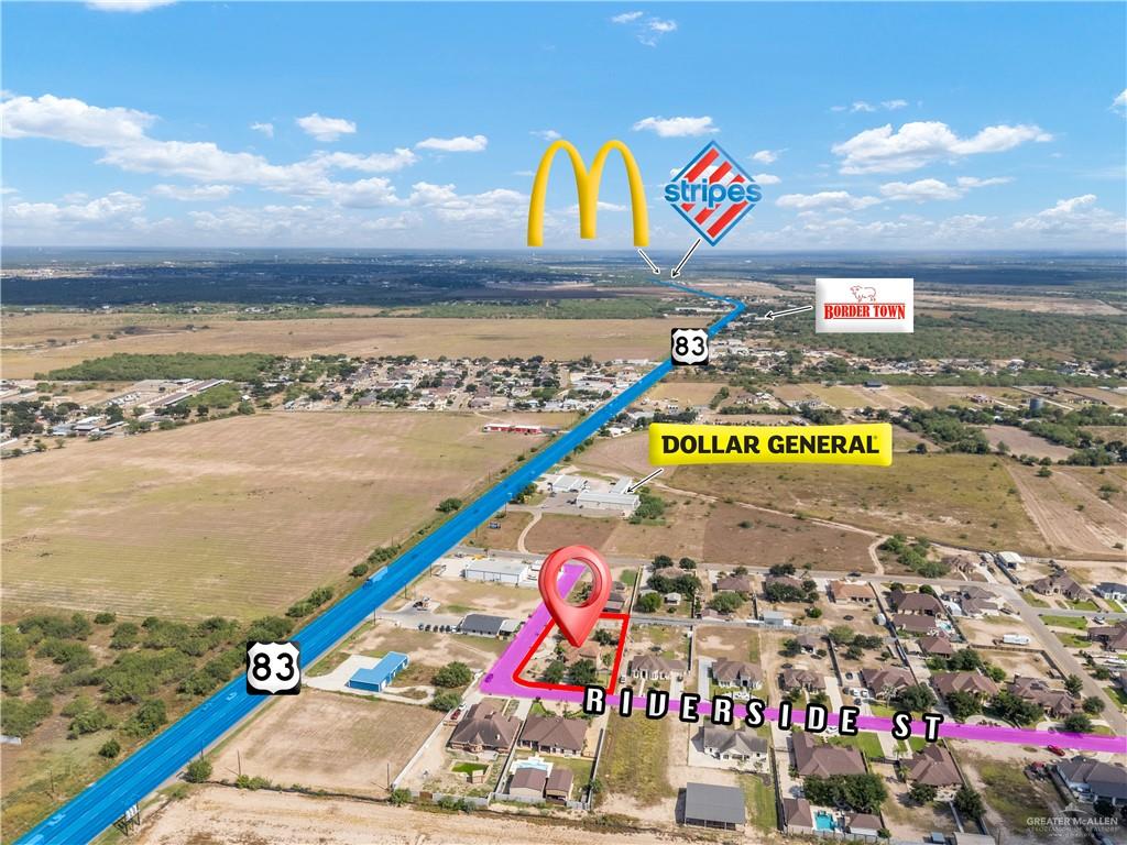 1257 Riverside Street Rio Grande City, TX 78582 - Photo 26 of 28 a view of swimming pool with a lake and mountain in the back