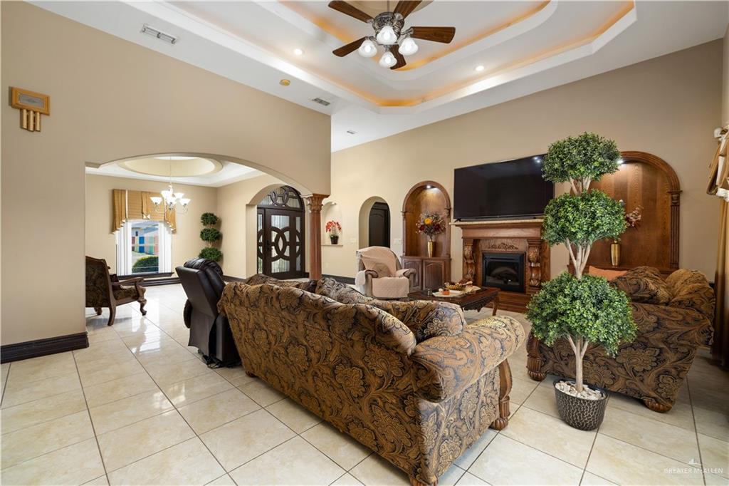 1257 Riverside Street Rio Grande City, TX 78582 - Photo 5 of 28 a living room with fireplace furniture and a potted plant