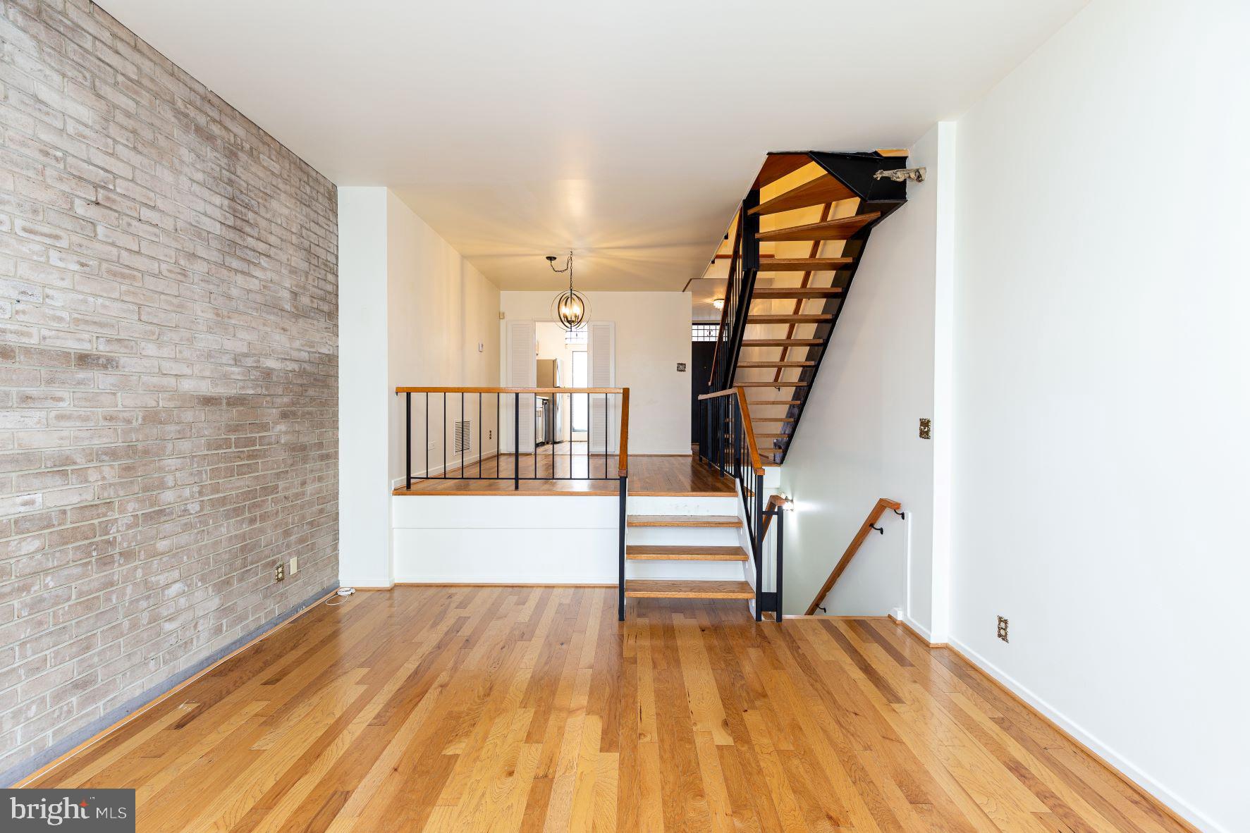 204 M Street Southwest, Unit 34 Washington, DC 20024 - Photo 13 of 28 a view of entryway with wooden floor