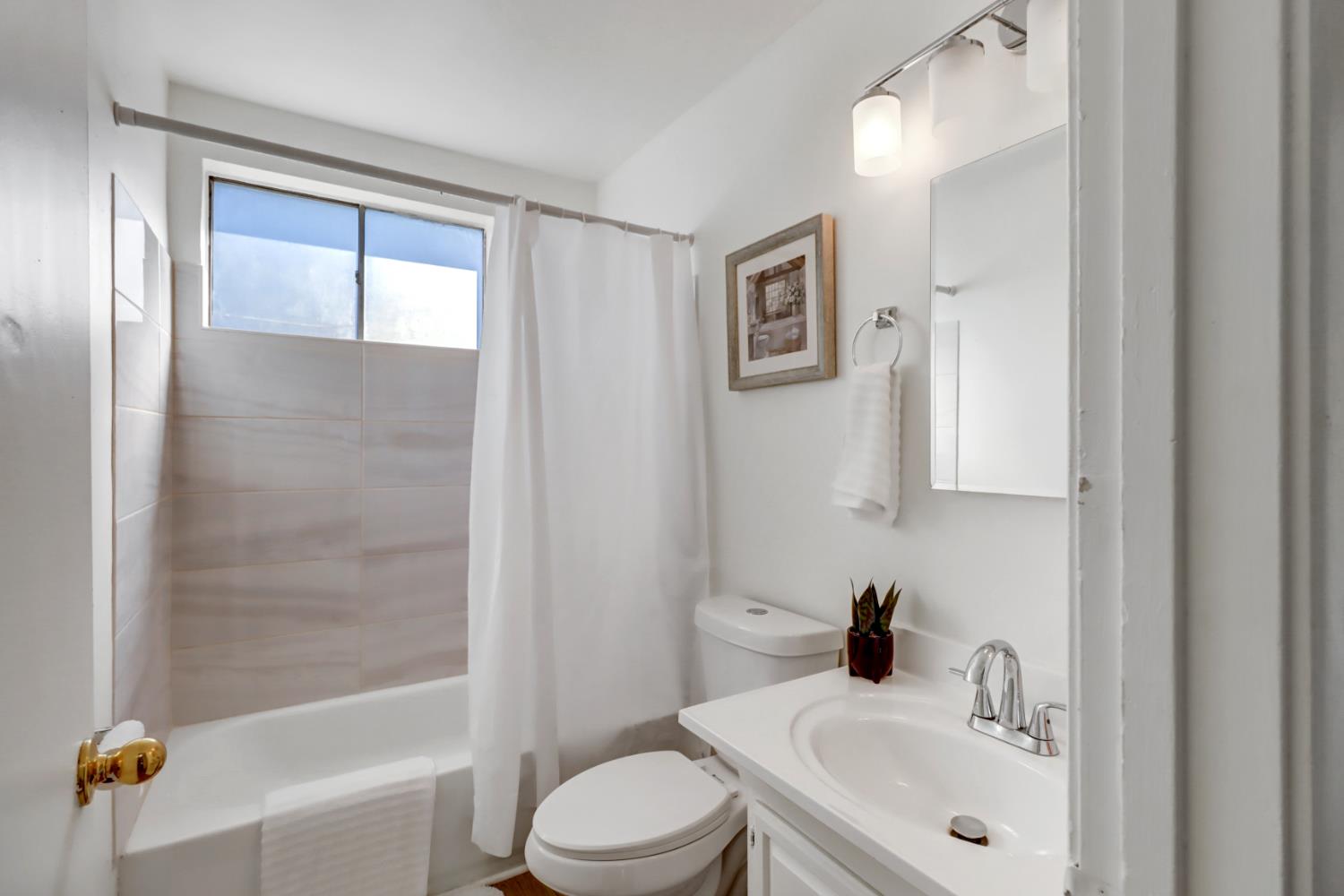 10556 Olson Drive Rancho Cordova, CA 95670 - Photo 29 of 46 a bathroom with a sink toilet and shower