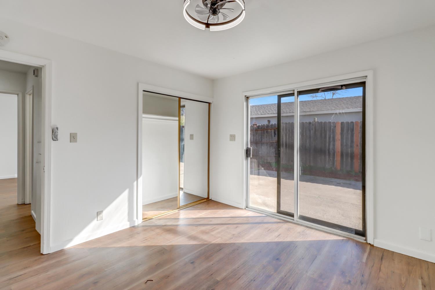 10556 Olson Drive Rancho Cordova, CA 95670 - Photo 32 of 46 a view of empty room with wooden floor