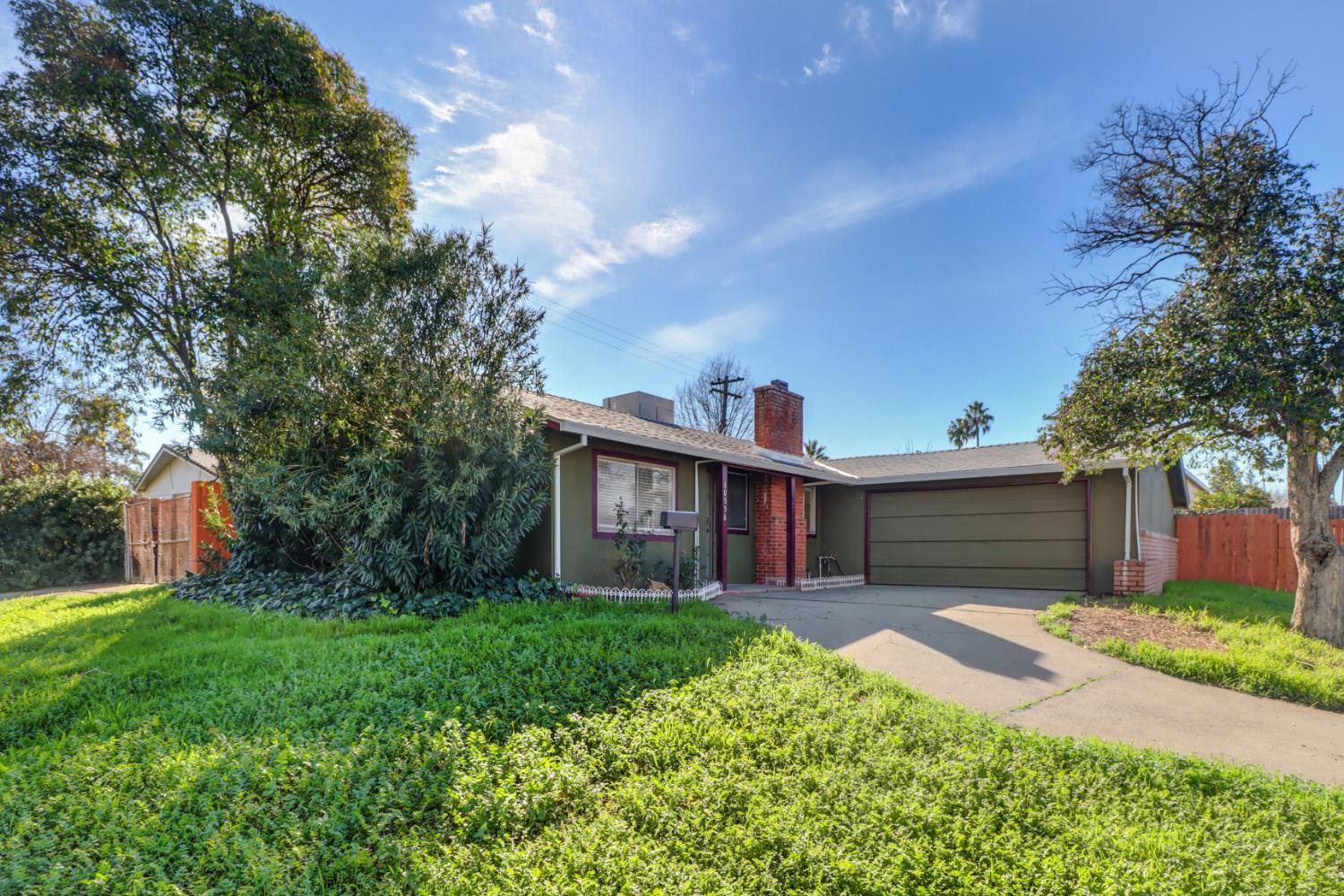 10556 Olson Drive Rancho Cordova, CA 95670 - Photo 45 of 46 a front view of a house with garden