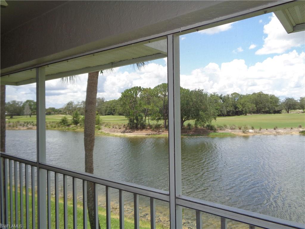 6250 Bellerive Avenue, Unit 5 Naples, FL 34119 - Photo 31 of 37 a view of lake