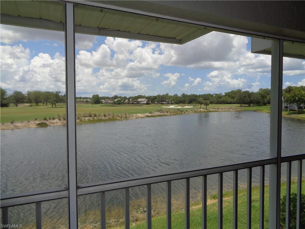 6250 Bellerive Avenue, Unit 5 Naples, FL 34119 - Photo 34 of 37 a view of a lake from a balcony