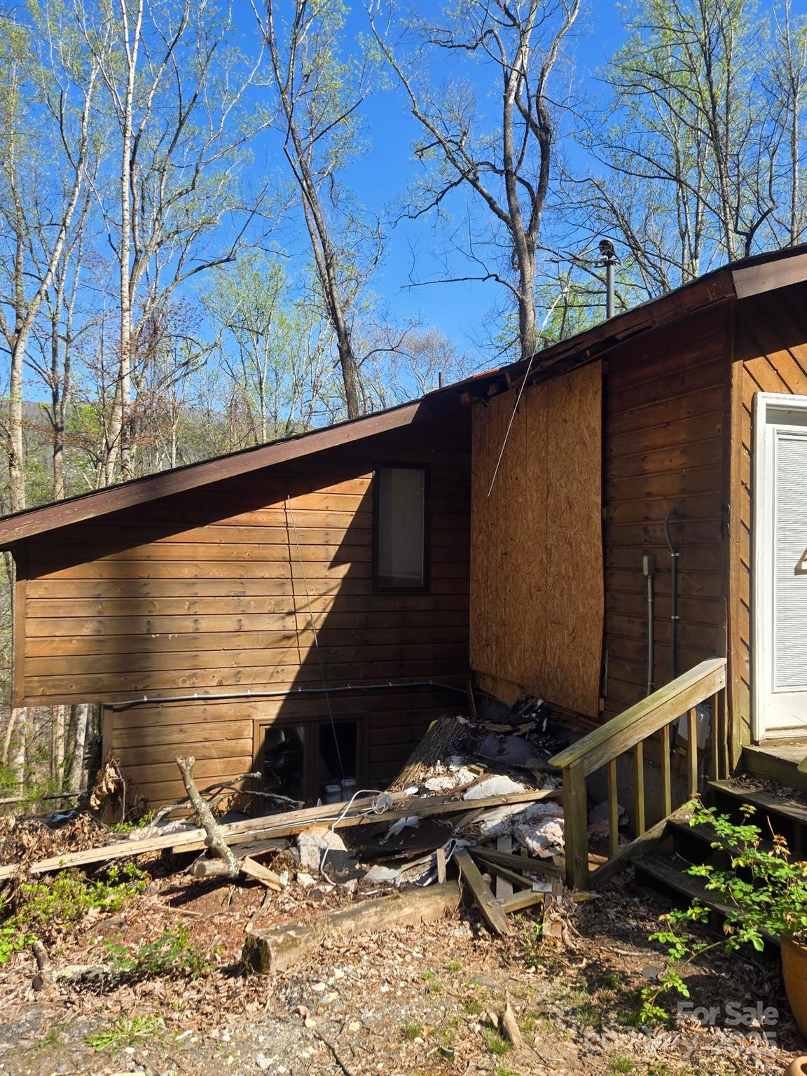 90 Weeping Cherry Forest Road Fairview, NC 28730 - Photo 3 of 3 a backyard of a house with yard and outdoor seating