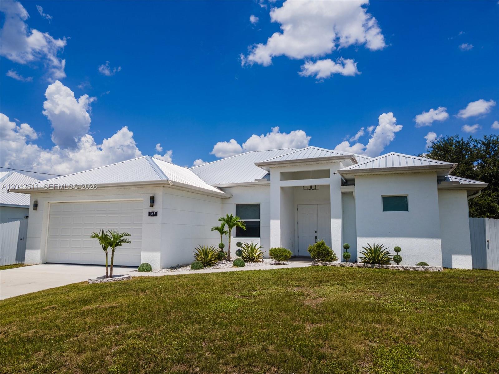 365 Ranier Avenue Lehigh Acres, FL 33974 - Photo 4 of 50