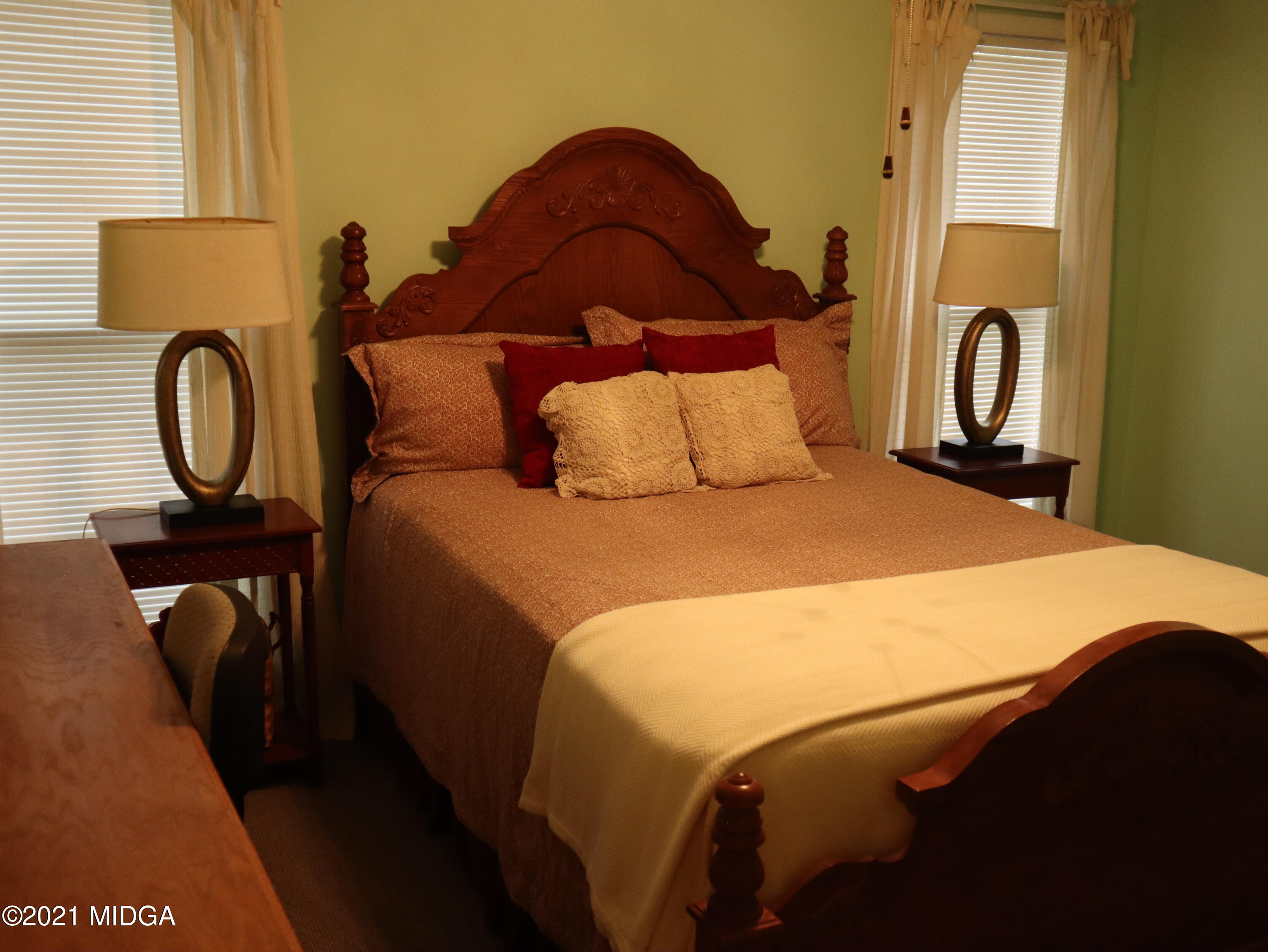 136 Timber Ridge Drive Macon, GA 31216 - Photo 14 of 20 a bedroom with a bed and a painting on the wall