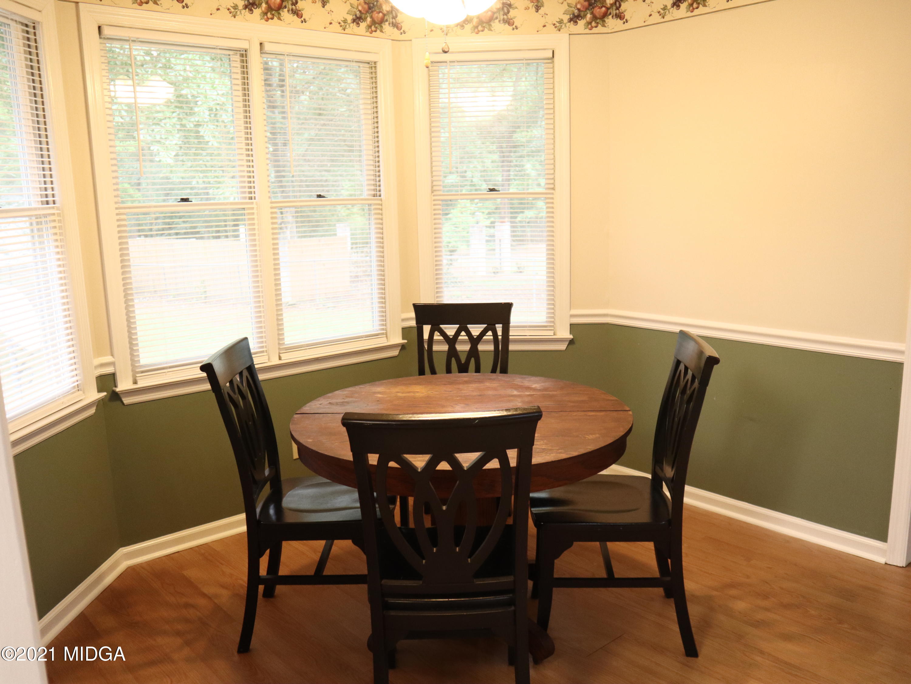 136 Timber Ridge Drive Macon, GA 31216 - Photo 7 of 20 a view of a dining room with furniture and window