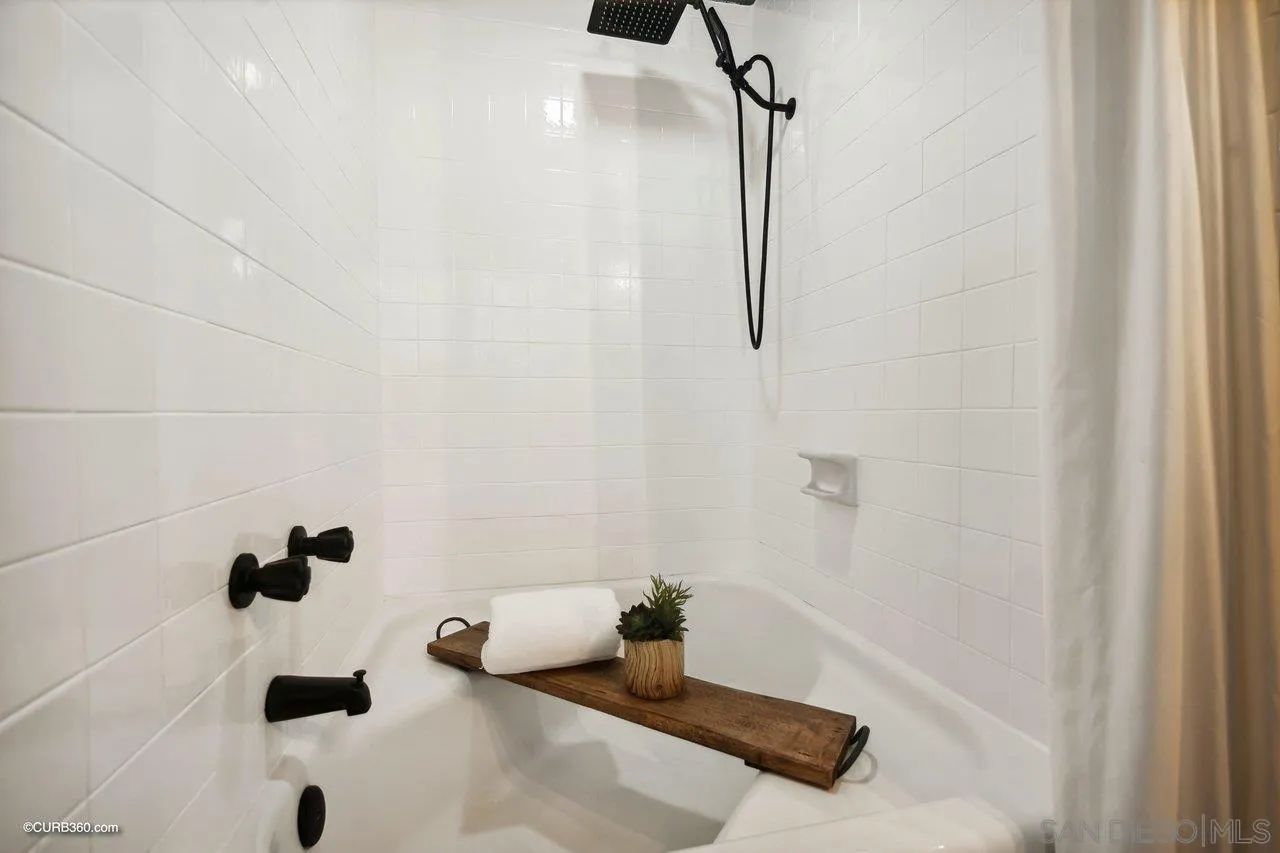 12218 Rancho Bernardo Road, Unit B San Diego, CA 92128 - Photo 26 of 30 a bathroom with a shower