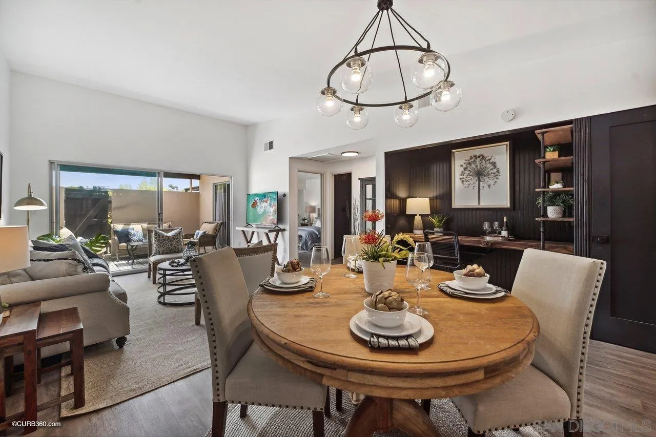 12218 Rancho Bernardo Road, Unit B San Diego, CA 92128 - Photo 10 of 30 a view of a dining room with furniture window and wooden floor