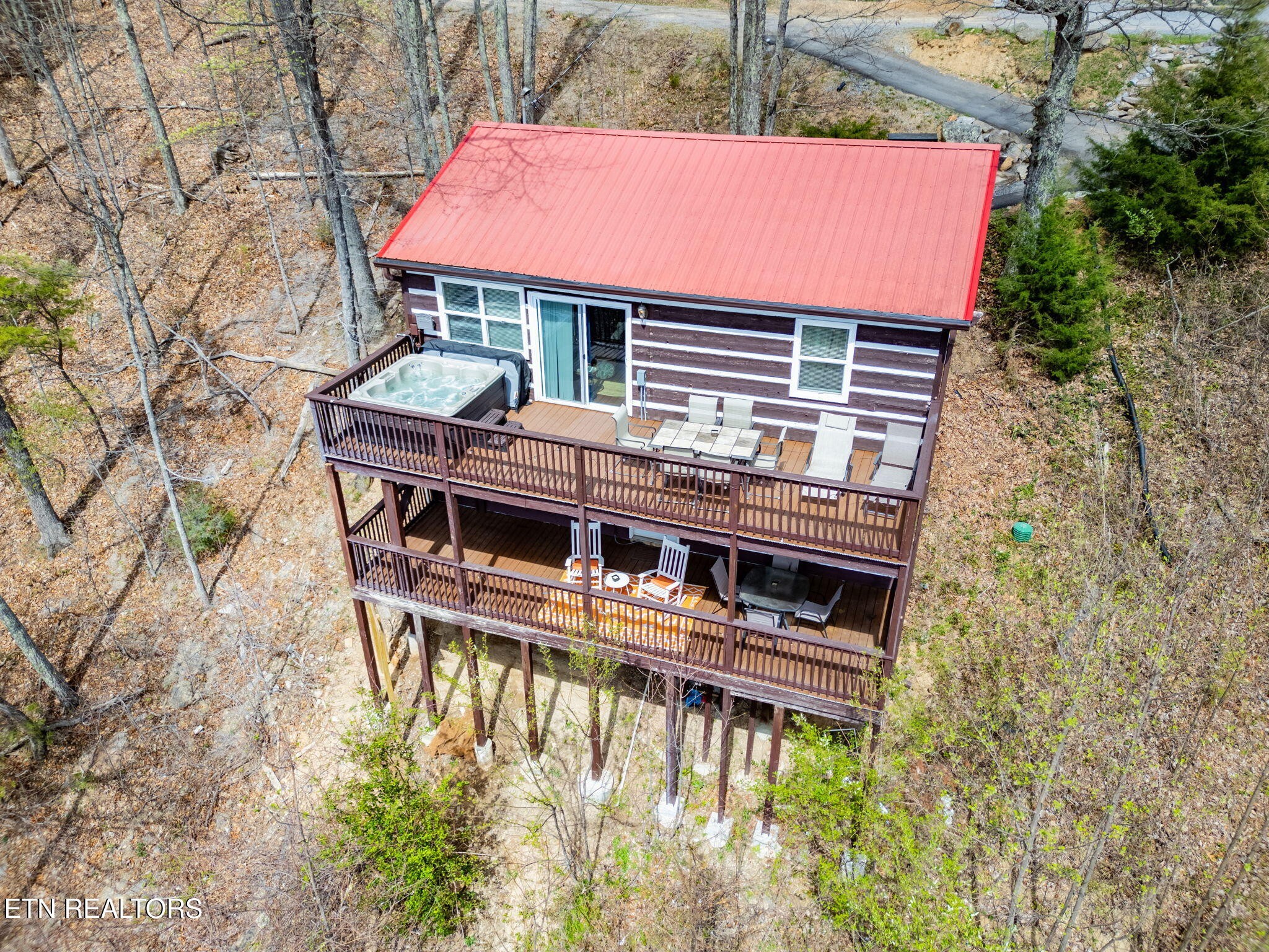 1115 Red Maple Lane Sevierville, TN 37876 - Photo 44 of 55 a backyard of a house with table and chairs
