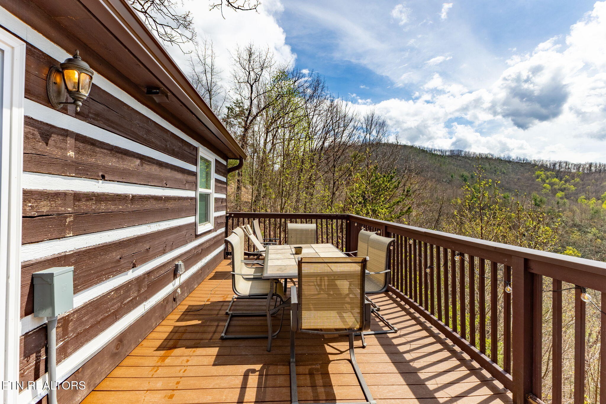 1115 Red Maple Lane Sevierville, TN 37876 - Photo 48 of 55 a balcony with wooden floor and city view