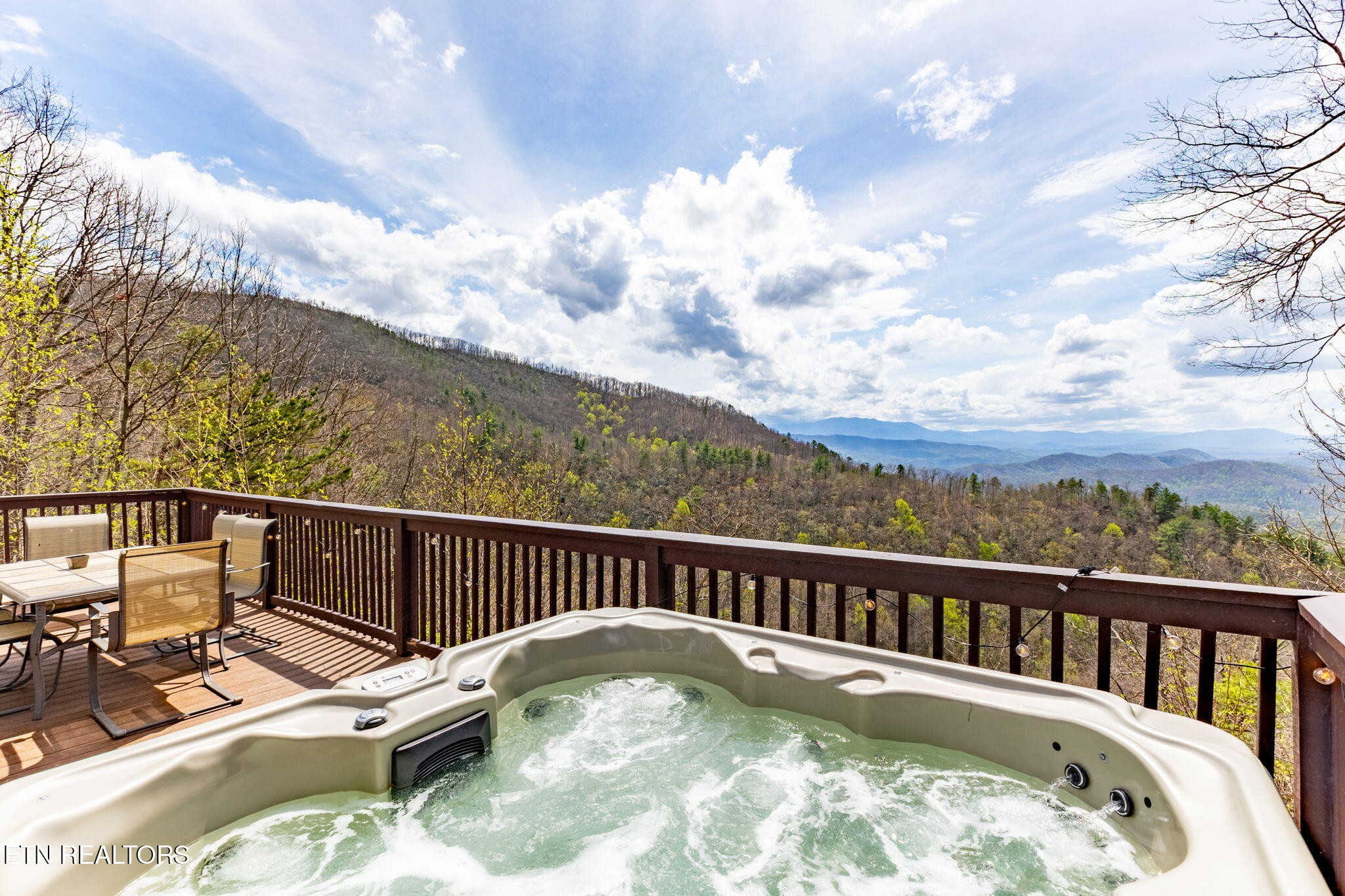 1115 Red Maple Lane Sevierville, TN 37876 - Photo 5 of 55 a view of a roof deck with wooden fence