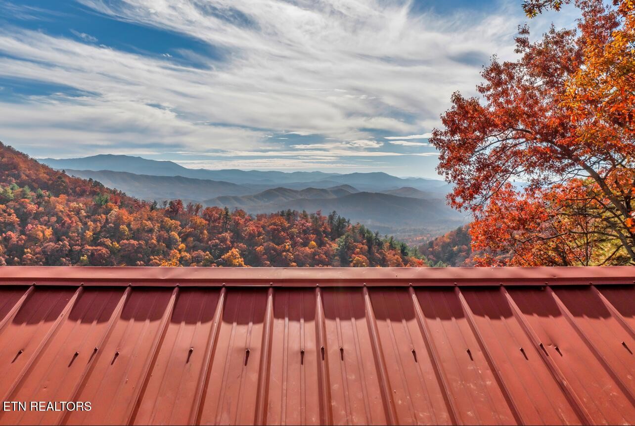 1115 Red Maple Lane Sevierville, TN 37876 - Photo 55 of 55 a view of balcony with wooden floor and fence