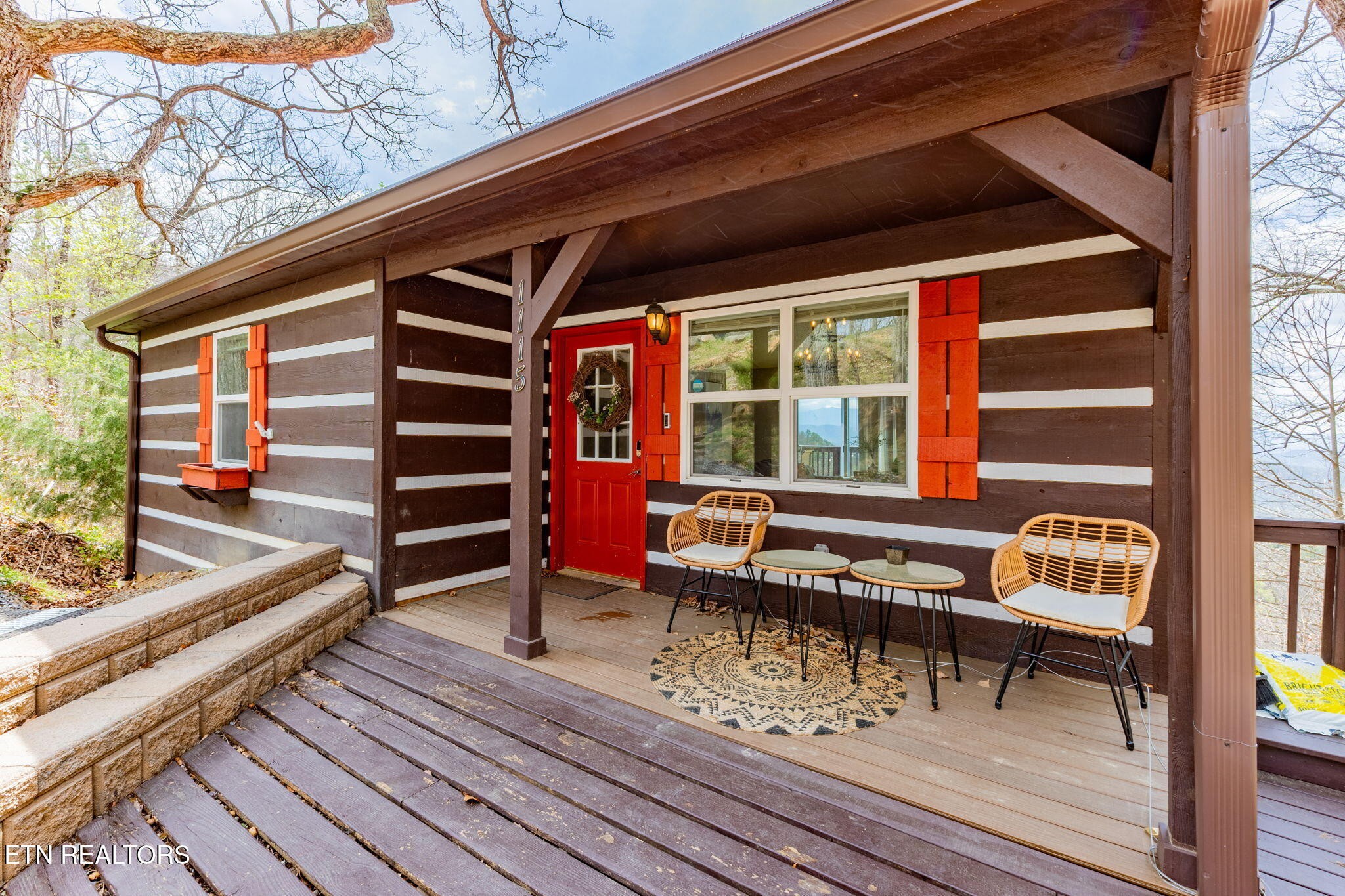 1115 Red Maple Lane Sevierville, TN 37876 - Photo 6 of 55 a balcony with wooden floor and furniture