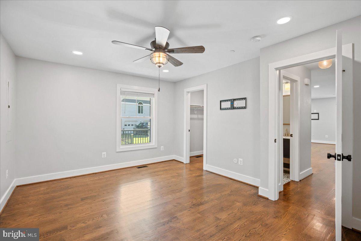 206 Point Lane Solomons, MD 20688 - Photo 20 of 46 Main level primary suite with walk-in closet