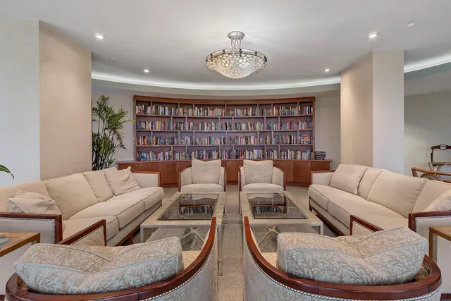 a swimming pool with outdoor seating yard and barbeque oven