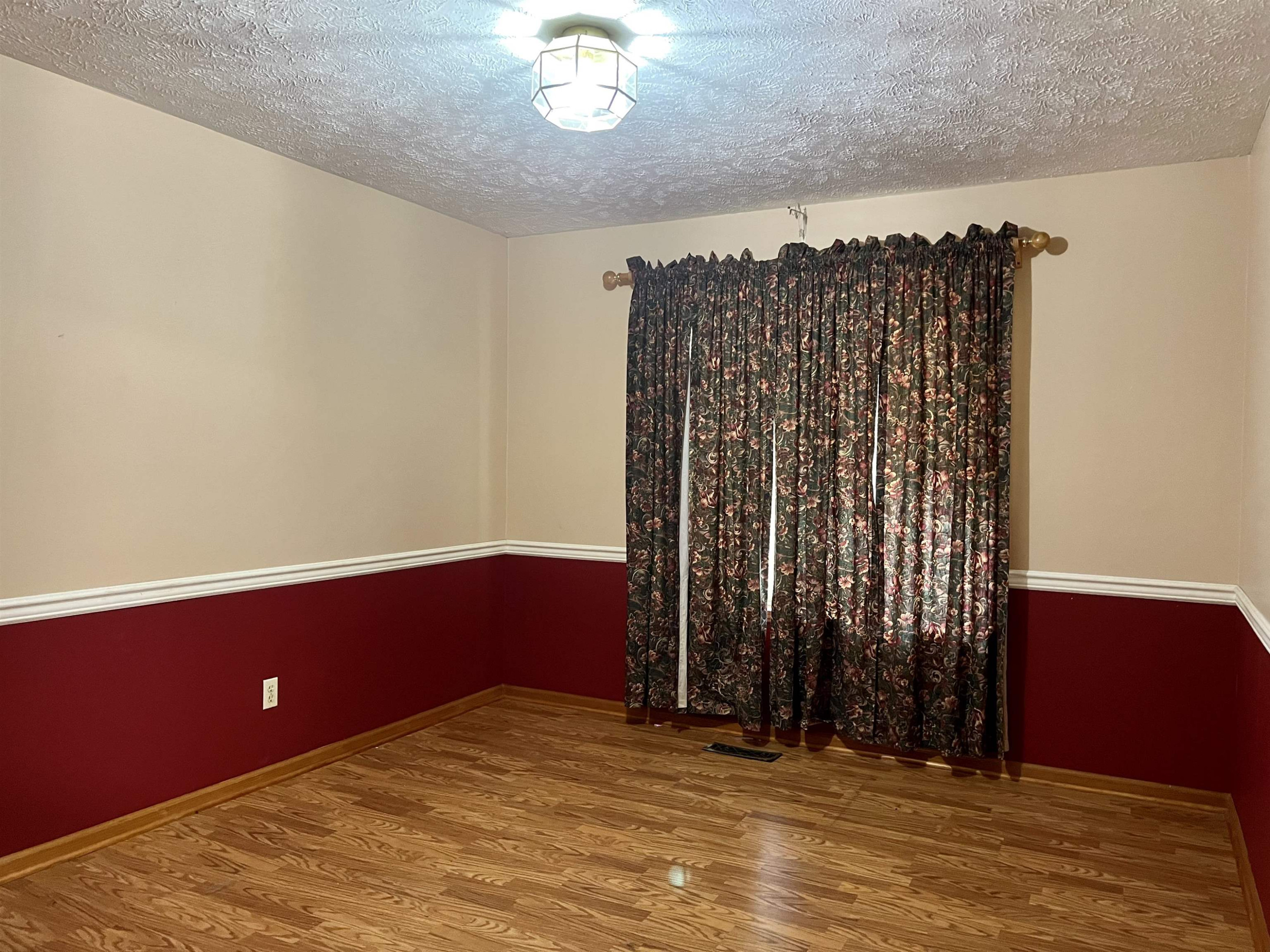 6100 Enville Road Henderson, TN 38340 - Photo 13 of 25 a view of a room with a fireplace and cabinets